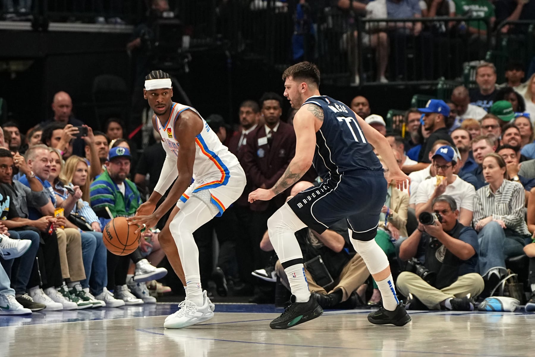 DALLAS, TX - MAY 13: Shai Gilgeous-Alexander #2 of the Oklahoma City Thunder handles the ball during the game against the Dallas Mavericks during Round Two Game Four of the 2024 NBA Playoffs on May 13, 2024 at the American Airlines Center in Dallas, Texas. NOTE TO USER: User expressly acknowledges and agrees that, by downloading and or using this photograph, User is consenting to the terms and conditions of the Getty Images License Agreement. Mandatory Copyright Notice: Copyright 2024 NBAE (Photo by Glenn James/NBAE via Getty Images)
