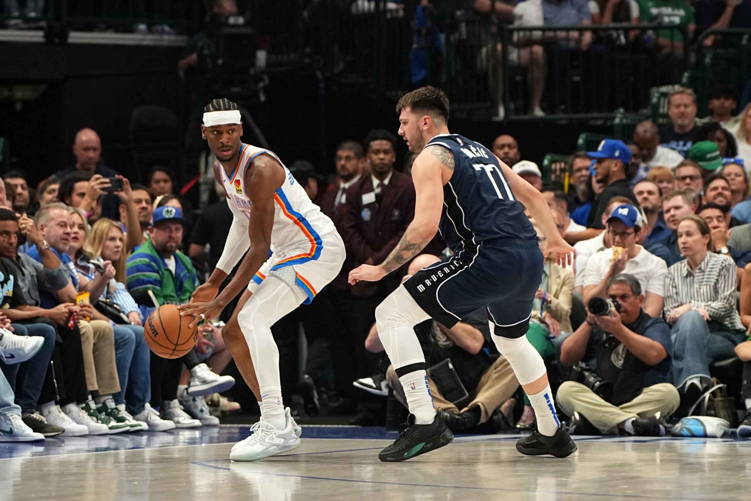 DALLAS, TX - MAY 13: Shai Gilgeous-Alexander #2 of the Oklahoma City Thunder handles the ball during the game against the Dallas Mavericks during Round Two Game Four of the 2024 NBA Playoffs on May 13, 2024 at the American Airlines Center in Dallas, Texas. NOTE TO USER: User expressly acknowledges and agrees that, by downloading and or using this photograph, User is consenting to the terms and conditions of the Getty Images License Agreement. Mandatory Copyright Notice: Copyright 2024 NBAE (Photo by Glenn James/NBAE via Getty Images)