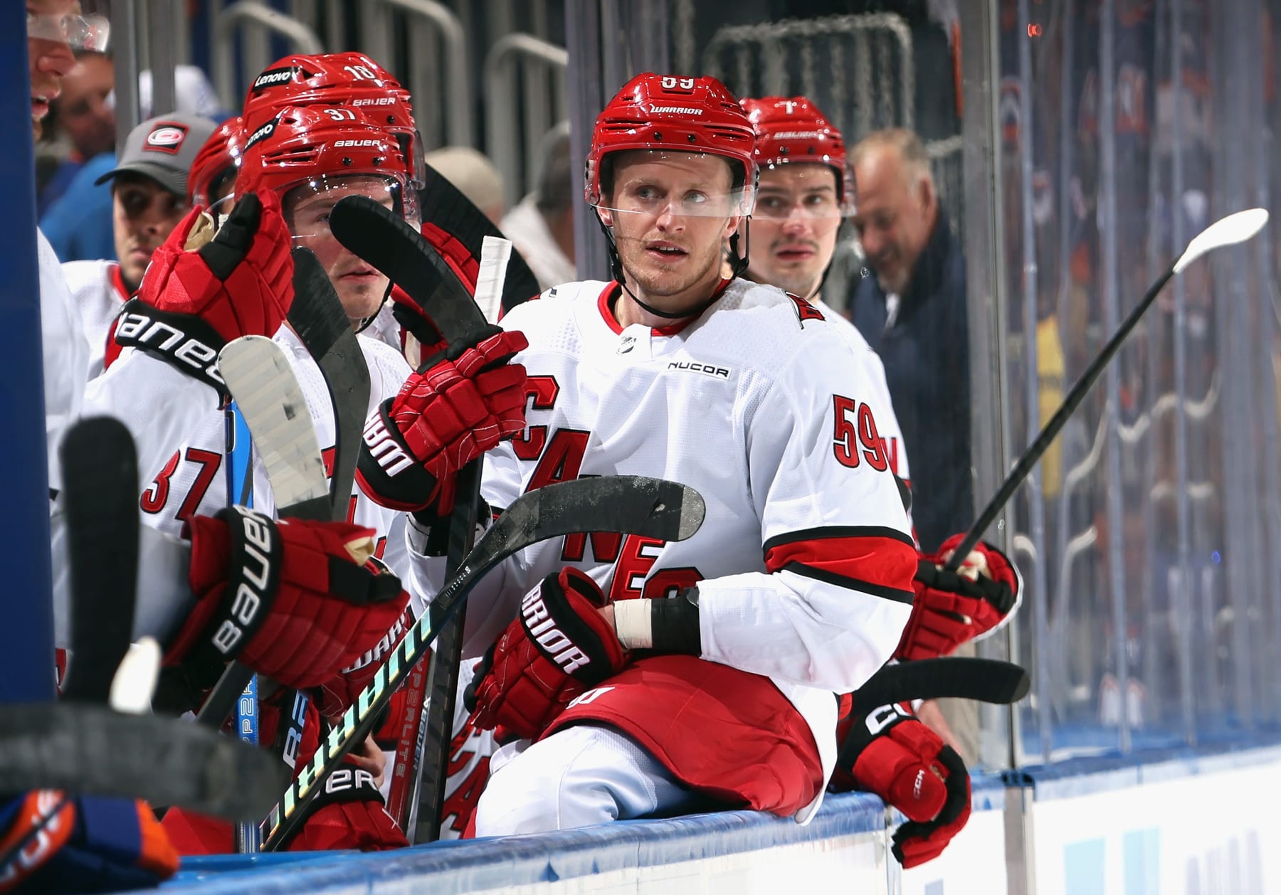 ELMONT, NEW YORK - APRIL 25: Jake Guentzel #59 of the Carolina Hurricanes watches the closing seconds of the first period against the New York Islanders in Game Three of the First Round of the 2024 Stanley Cup Playoffs at UBS Arena on April 25, 2024 in Elmont, New York.  (Photo by Bruce Bennett/Getty Images)