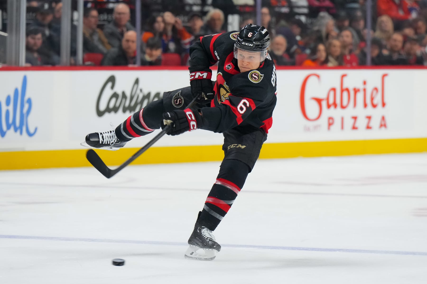 OTTAWA, CANADA - MARCH 24:  Jakob Chychrun #6 of the Ottawa Senators shoots the puck against the Edmonton Oilers at Canadian Tire Centre on March 24, 2024 in Ottawa, Ontario, Canada.  (Photo by André Ringuette/NHLI via Getty Images)