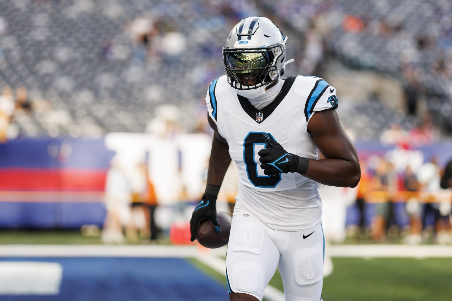 EAST RUTHERFORD, NEW JERSEY - AUGUST 18: Brian Burns #0 of the Carolina Panthers runs during pregame warmups prior to an NFL preseason football game against the New York Giants at MetLife Stadium on August 18, 2023 in East Rutherford, New Jersey. (Photo by Ryan Kang/Getty Images)