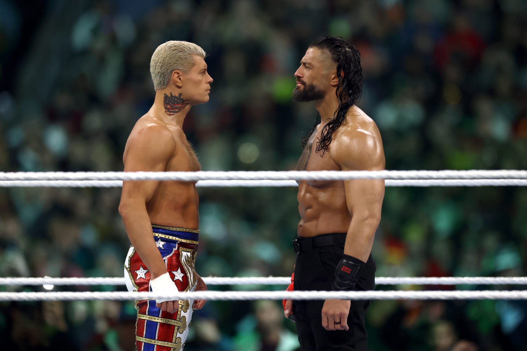 PHILADELPHIA, PENNSYLVANIA - APRIL 07: Roman Reigns and Cody Rhodes look on during Night Two at Lincoln Financial Field on April 07, 2024 in Philadelphia, Pennsylvania.  (Photo by Tim Nwachukwu/Getty Images)