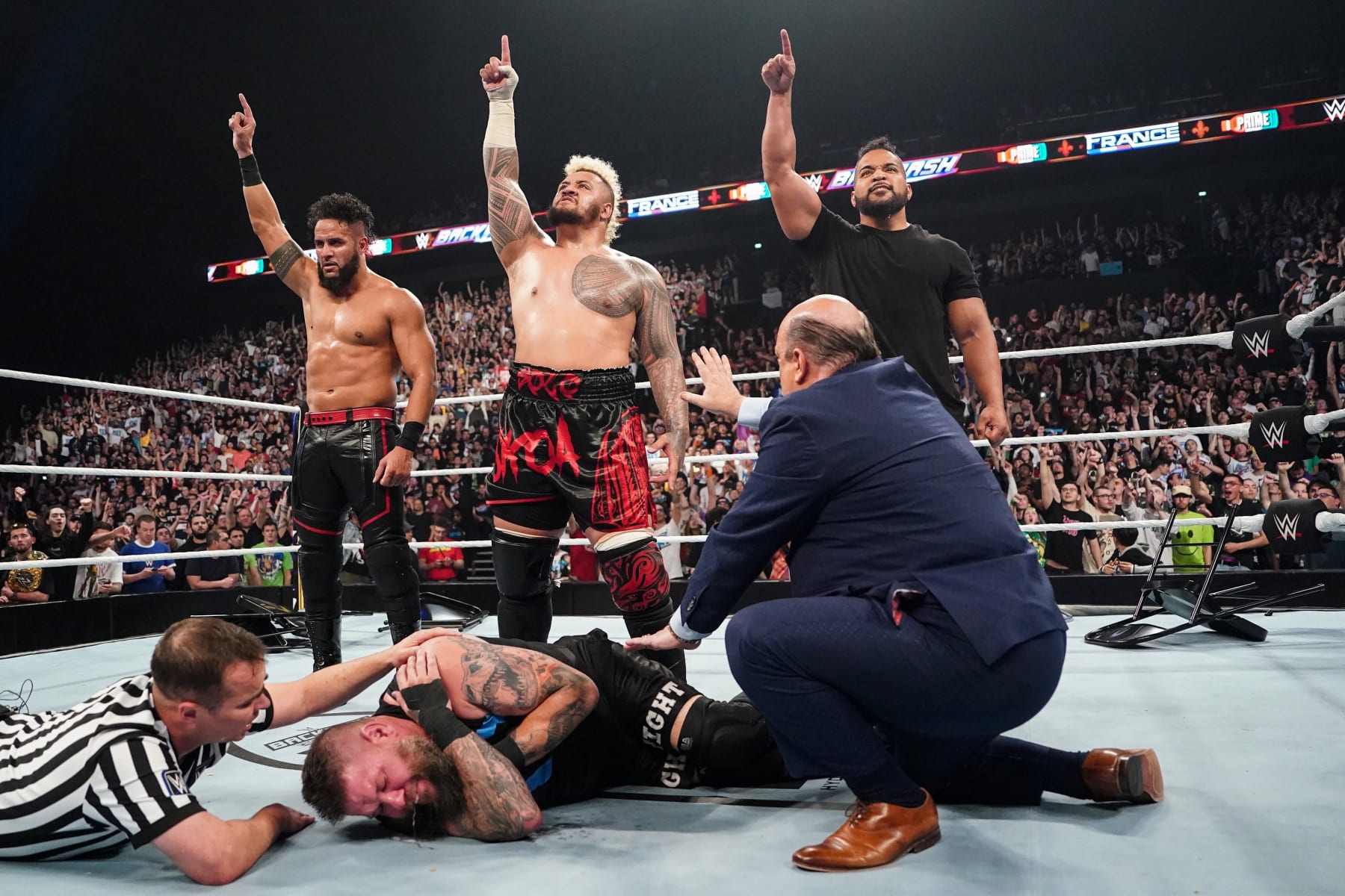 LYON, FRANCE - MAY 4: The NEW Bloodline, Tama Tonga, Solo Sikoa and Tanga Loa celebrate their win during Backlash France at LDLC Arena on May 4, 2024 in Lyon, France. (Photo by WWE/Getty Images)