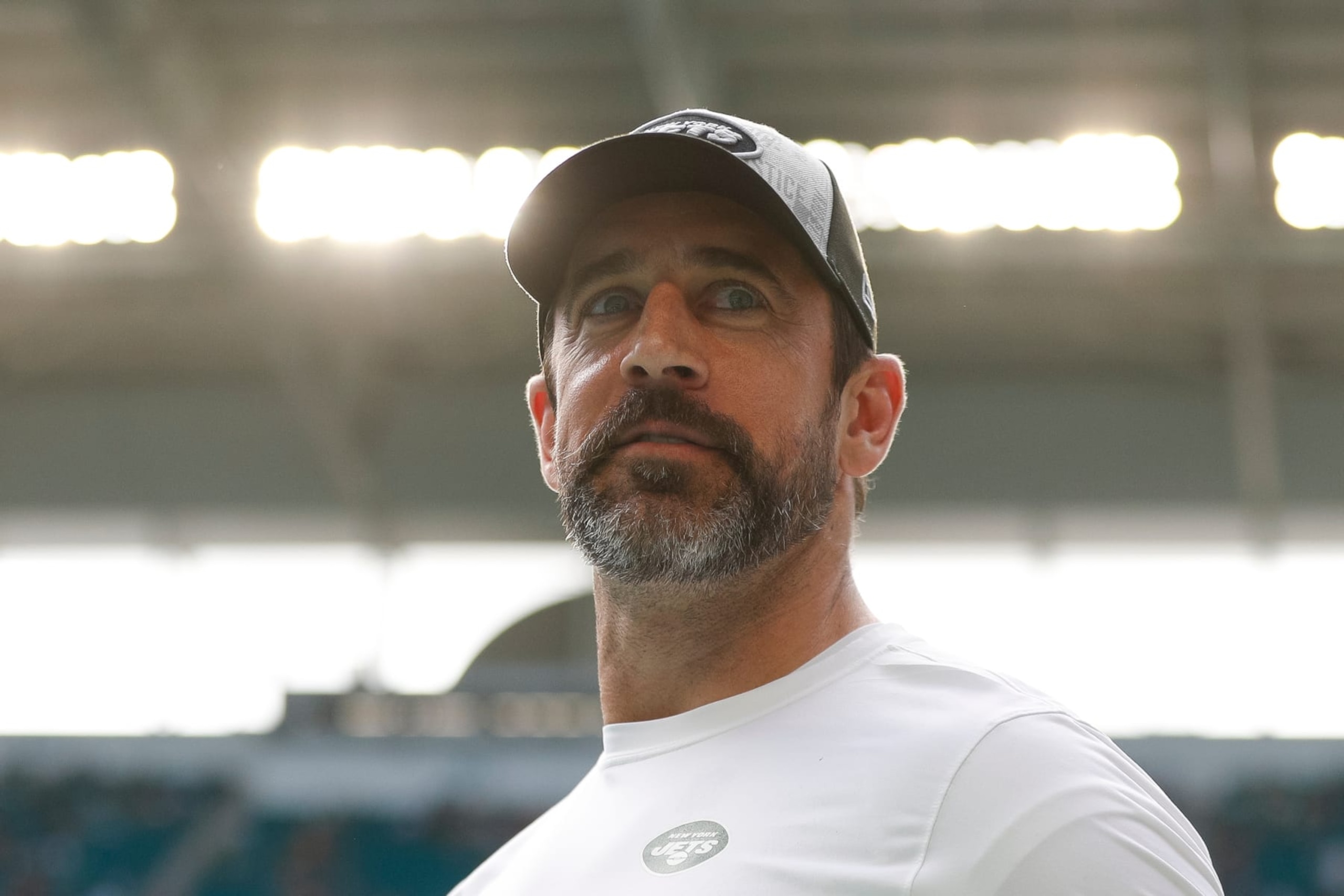 MIAMI GARDENS, FLORIDA - DECEMBER 17: Aaron Rodgers of the New York Jets walks on the field prior to a game against the Miami Dolphins at Hard Rock Stadium on December 17, 2023 in Miami Gardens, Florida. (Photo by Brandon Sloter/Image Of Sport/Getty Images)