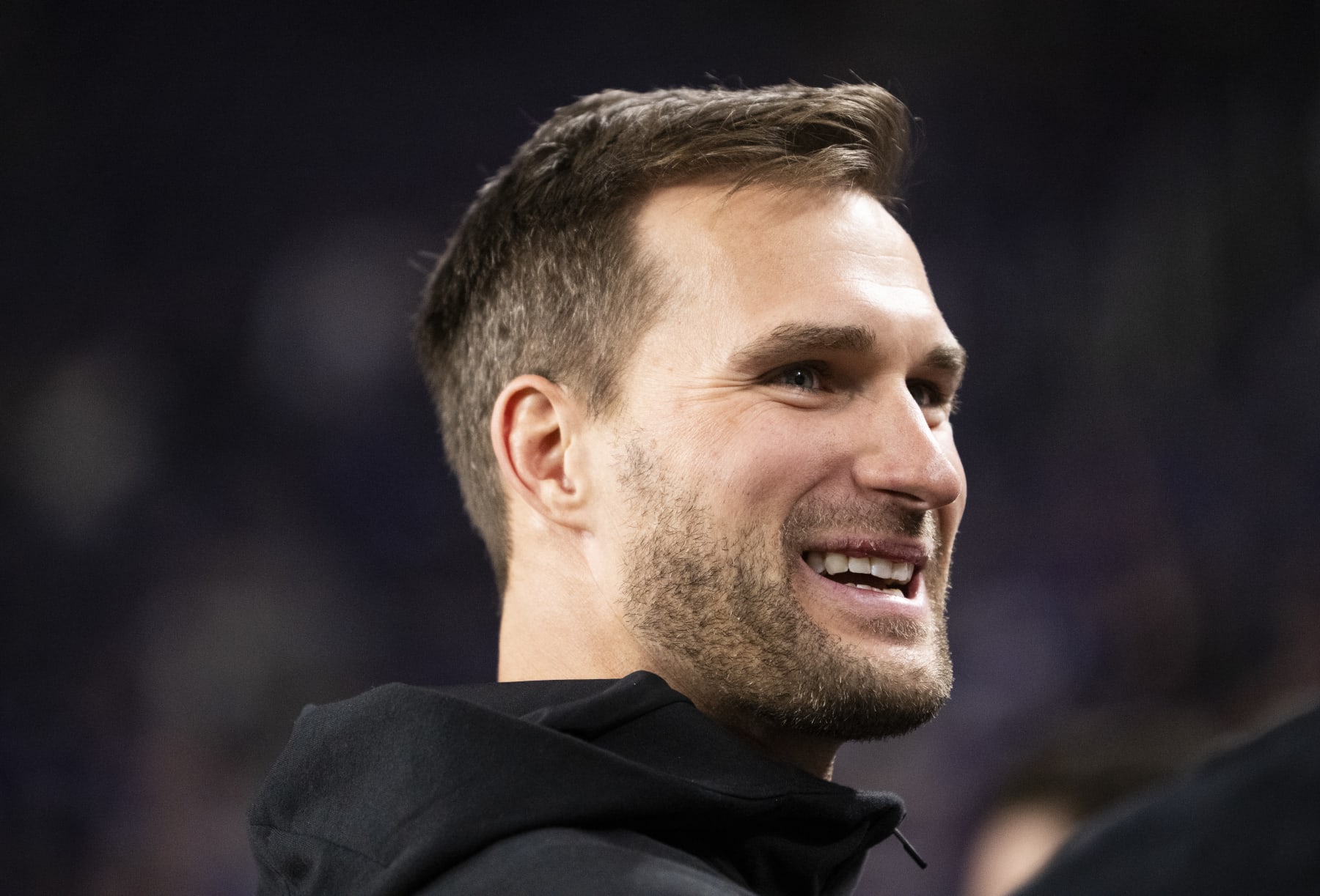 MINNEAPOLIS, MINNESOTA - DECEMBER 31: Kirk Cousins #8 of the Minnesota Vikings looks on from the sidelines before the game against the Green Bay Packers at U.S. Bank Stadium on December 31, 2023 in Minneapolis, Minnesota. (Photo by Stephen Maturen/Getty Images)