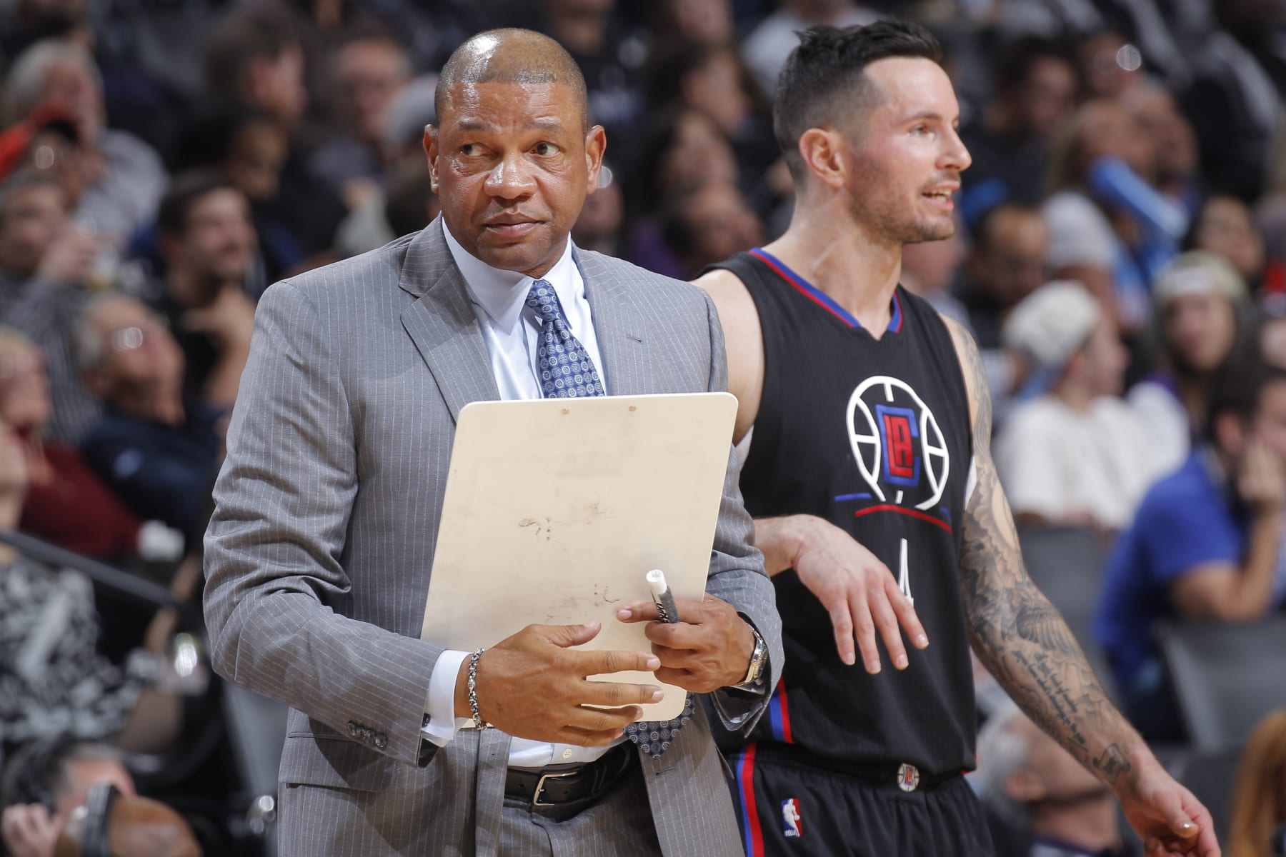 SACRAMENTO, CA - NOVEMBER 18: Head Coach Doc Rivers of the Los Angeles Clippers coaches J.J. Redick #4 against the Sacramento Kings on November 18, 2016 at Golden 1 Center in Sacramento, California. NOTE TO USER: User expressly acknowledges and agrees that, by downloading and or using this photograph, User is consenting to the terms and conditions of the Getty Images Agreement. Mandatory Copyright Notice: Copyright 2016 NBAE (Photo by Rocky Widner/NBAE via Getty Images)