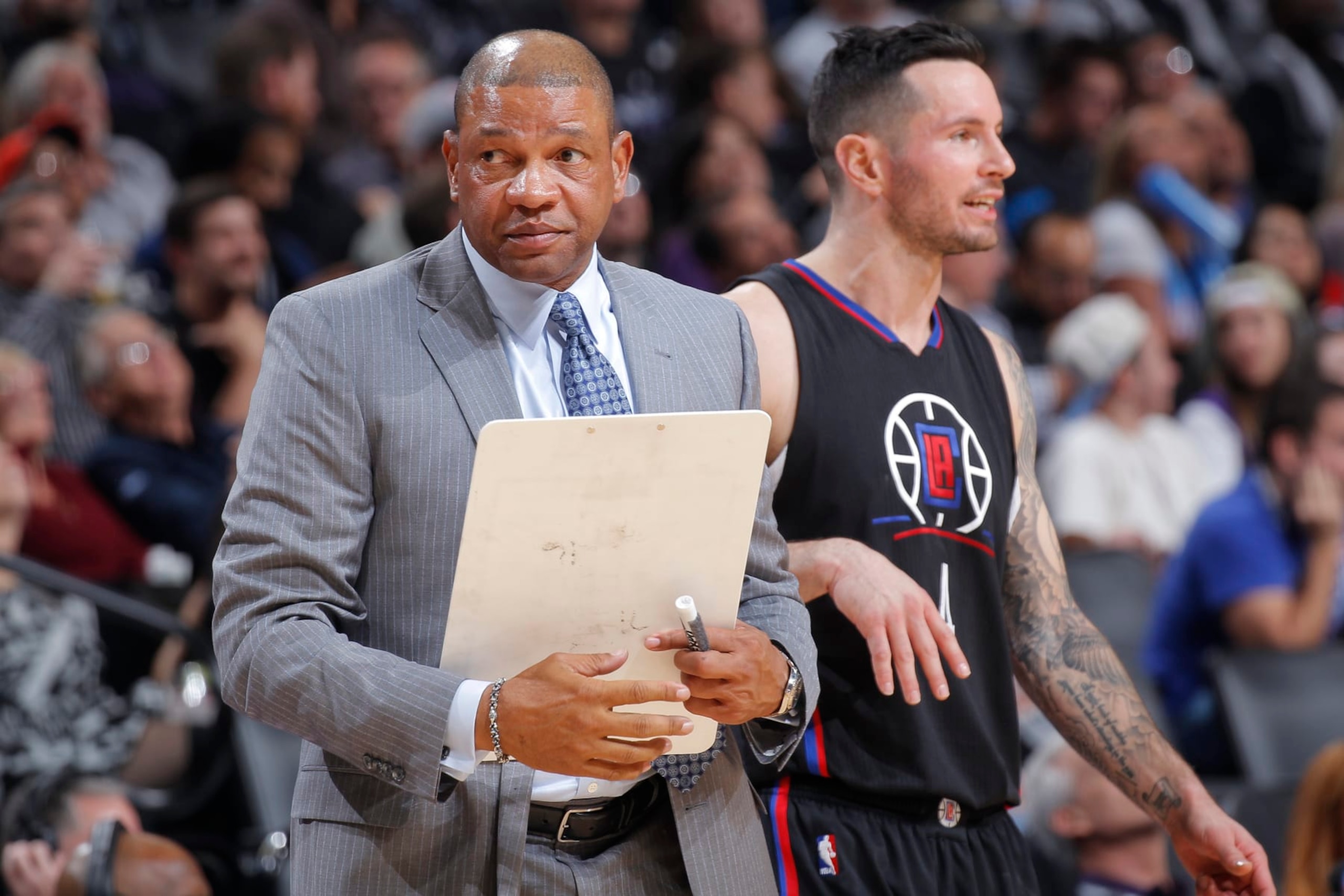 SACRAMENTO, CA - NOVEMBER 18: Head Coach Doc Rivers of the Los Angeles Clippers coaches J.J. Redick #4 against the Sacramento Kings on November 18, 2016 at Golden 1 Center in Sacramento, California. NOTE TO USER: User expressly acknowledges and agrees that, by downloading and or using this photograph, User is consenting to the terms and conditions of the Getty Images Agreement. Mandatory Copyright Notice: Copyright 2016 NBAE (Photo by Rocky Widner/NBAE via Getty Images) SACRAMENTO, CA - NOVEMBER 18: Head Coach Doc Rivers of the Los Angeles Clippers coaches J.J. Redick #4 against the Sacramento Kings on November 18, 2016 at Golden 1 Center in Sacramento, California. NOTE TO USER: User expressly acknowledges and agrees that, by downloading and or using this photograph, User is consenting to the terms and conditions of the Getty Images Agreement. Mandatory Copyright Notice: Copyright 2016 NBAE (Photo by Rocky Widner/NBAE via Getty Images)