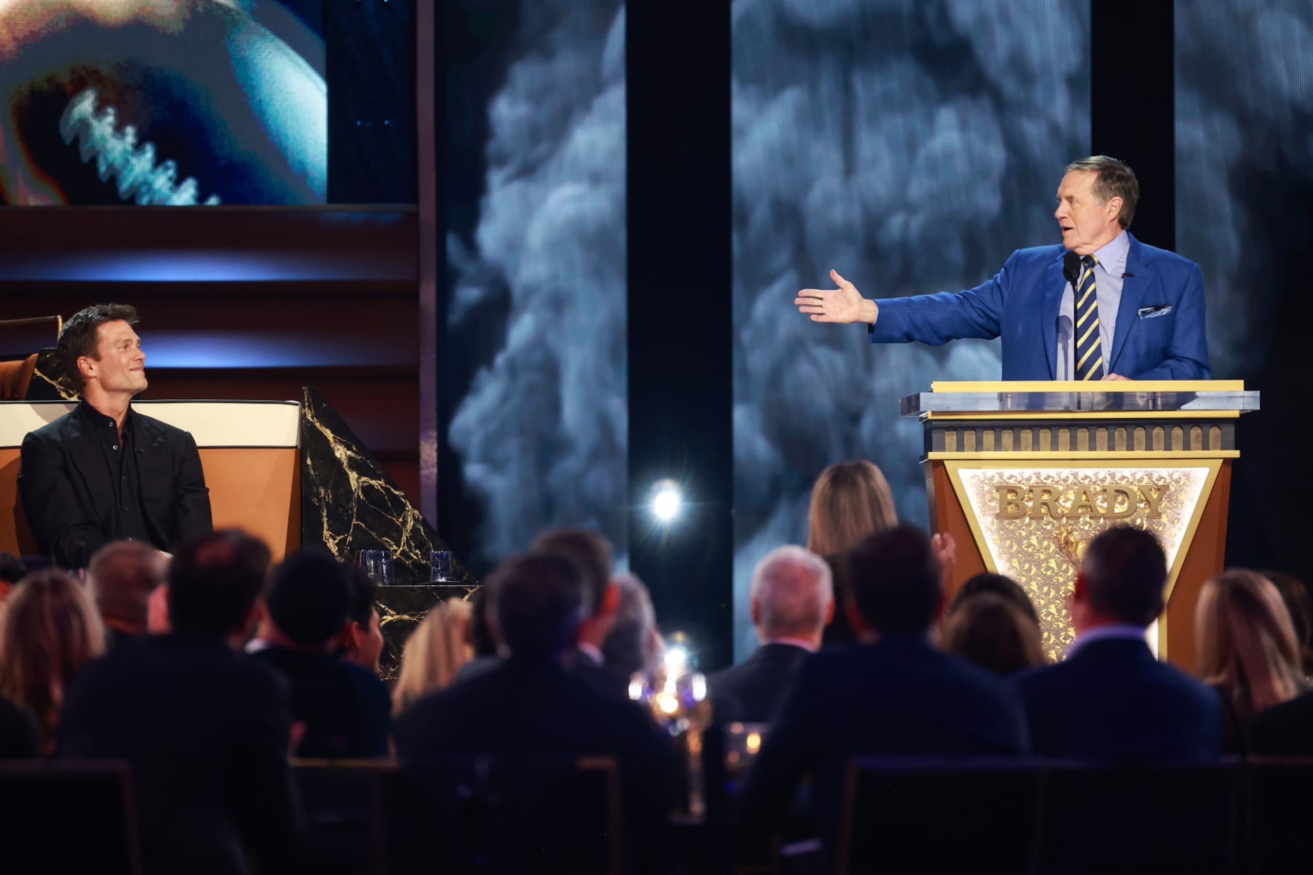 INGLEWOOD, CALIFORNIA - MAY 05: (L-R) Tom Brady and Robert Kraft speak onstage during G.R.O.A.T The Greatest Roast Of All Time: Tom Brady for the Netflix is a Joke Festival at The Kia Forum on May 05, 2024 in Inglewood, California.  (Photo by Matt Winkelmeyer/Getty Images for Netflix)