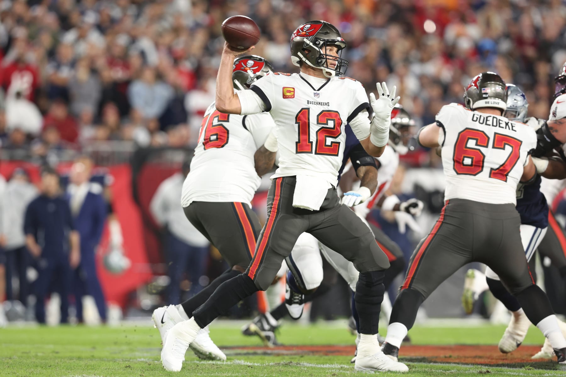 TAMPA, FLORIDA - JANUARY 16: Tom Brady  #12 of the Tampa Bay Buccaneers throws a pass against the Dallas Cowboys  during the  NFC Wild Card Playoff game at Raymond James Stadium on January 16, 2023 in Tampa, Florida. (Perry Knotts/Getty Images)