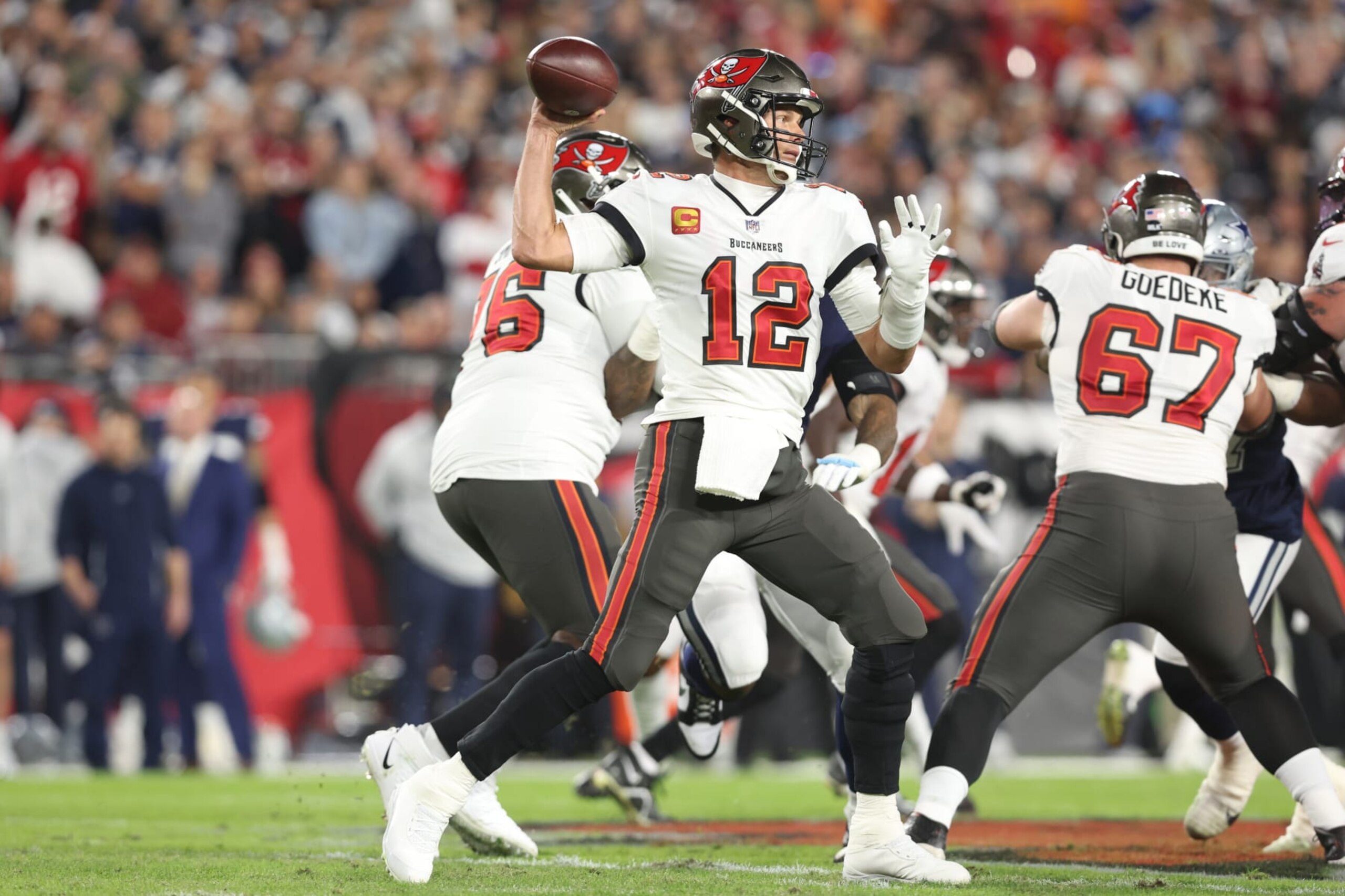 TAMPA, FLORIDA - JANUARY 16: Tom Brady  #12 of the Tampa Bay Buccaneers throws a pass against the Dallas Cowboys  during the  NFC Wild Card Playoff game at Raymond James Stadium on January 16, 2023 in Tampa, Florida. (Perry Knotts/Getty Images)