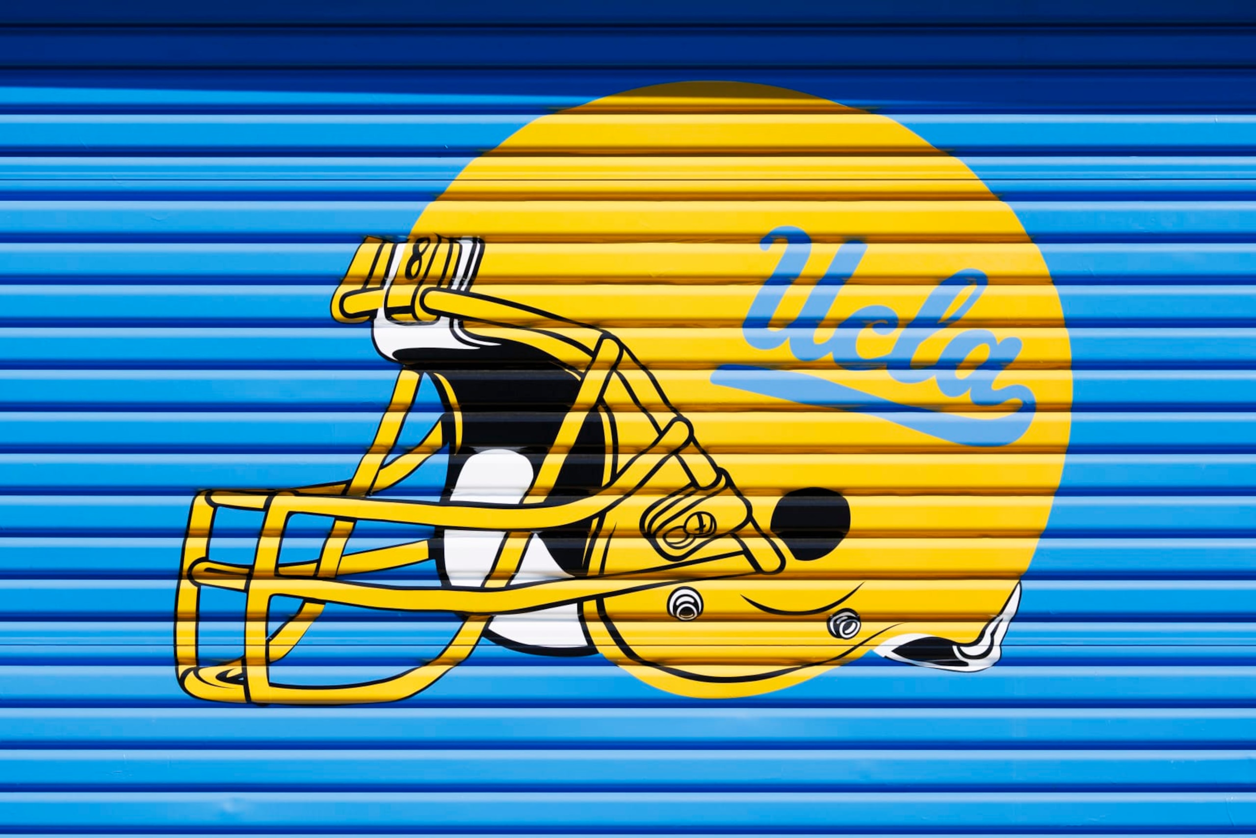 LOS ANGELES, CALIFORNIA - MARCH 15: A detail view of an UCLA Bruins helmet logo at Spaulding Field at the Wasserman Football Center on March 15, 2024 in Los Angeles, California. (Photo by Ric Tapia/Getty Images)