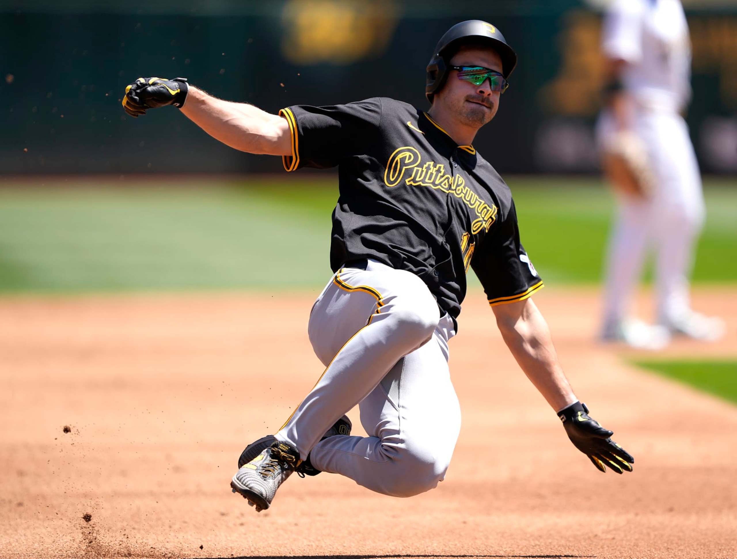 OAKLAND, CALIFORNIA - MAY 01: Bryan Reynolds #10 of the Pittsburgh Pirates slides into third base against the Oakland Athletics in the top of the third inning on May 1, 2024 at the Oakland Coliseum in Oakland, California. (Photo by Thearon W. Henderson/Getty Images) OAKLAND, CALIFORNIA - MAY 01: Bryan Reynolds #10 of the Pittsburgh Pirates slides into third base against the Oakland Athletics in the top of the third inning on May 1, 2024 at the Oakland Coliseum in Oakland, California. (Photo by Thearon W. Henderson/Getty Images)