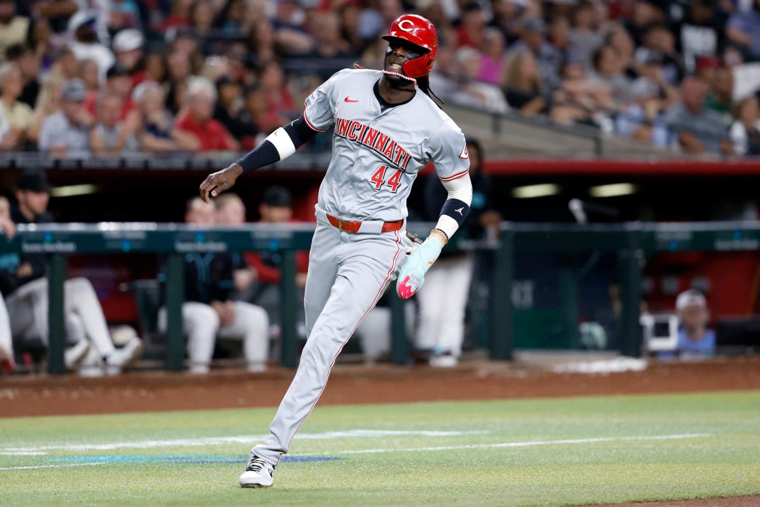PHOENIX, ARIZONA - MAY 13: Elly De La Cruz #44 of the Cincinnati Reds scores a run on a hit by Spencer Steer during the third inning against the Arizona Diamondbacks at Chase Field on May 13, 2024 in Phoenix, Arizona. (Photo by Chris Coduto/Getty Images) PHOENIX, ARIZONA - MAY 13: Elly De La Cruz #44 of the Cincinnati Reds scores a run on a hit by Spencer Steer during the third inning against the Arizona Diamondbacks at Chase Field on May 13, 2024 in Phoenix, Arizona. (Photo by Chris Coduto/Getty Images)