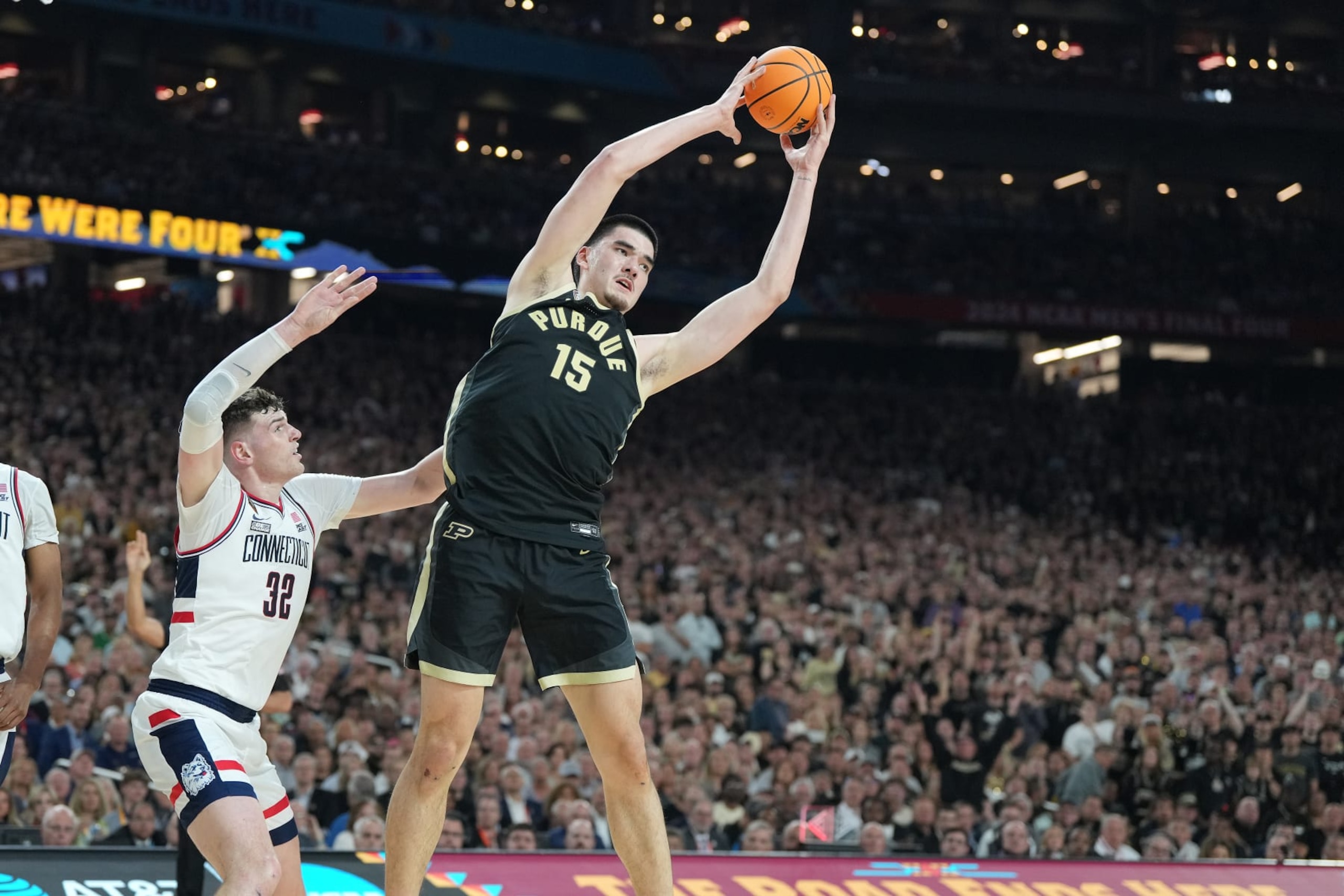 GLENDALE, ARIZONA - APRIL 08:  Zach Edey #15 of the Purdue Boilermakers grabs a rebound during the National College Basketball Championship game against the Connecticut Huskies at State Farm Stadium on April 08, 2024 in Glendale, Arizona.  (Photo by Mitchell Layton/Getty Images)