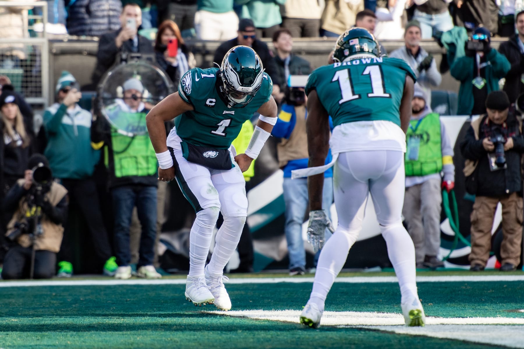 PHILADELPHIA, PA - NOVEMBER 27: Philadelphia Eagles quarterback Jalen Hurts (1) celebrates with Philadelphia Eagles wide receiver A.J. Brown (11) after scoring a touchdown during the first half of the National Football League game between the Tennessee Titans and Philadelphia Eagles on Sunday, December 4, 2022 at Lincoln Financial Field in Philadelphia, PA (Photo by John Jones/Icon Sportswire via Getty Images)