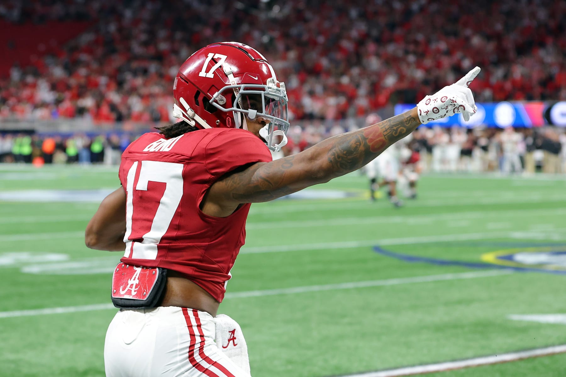 ATLANTA, GEORGIA - DECEMBER 02: Isaiah Bond #17 of the Alabama Crimson Tide reacts after a first down catch against Daylen Everette #6 of the Georgia Bulldogs during the second quarter in the SEC Championship at Mercedes-Benz Stadium on December 02, 2023 in Atlanta, Georgia. (Photo by Kevin C. Cox/Getty Images)