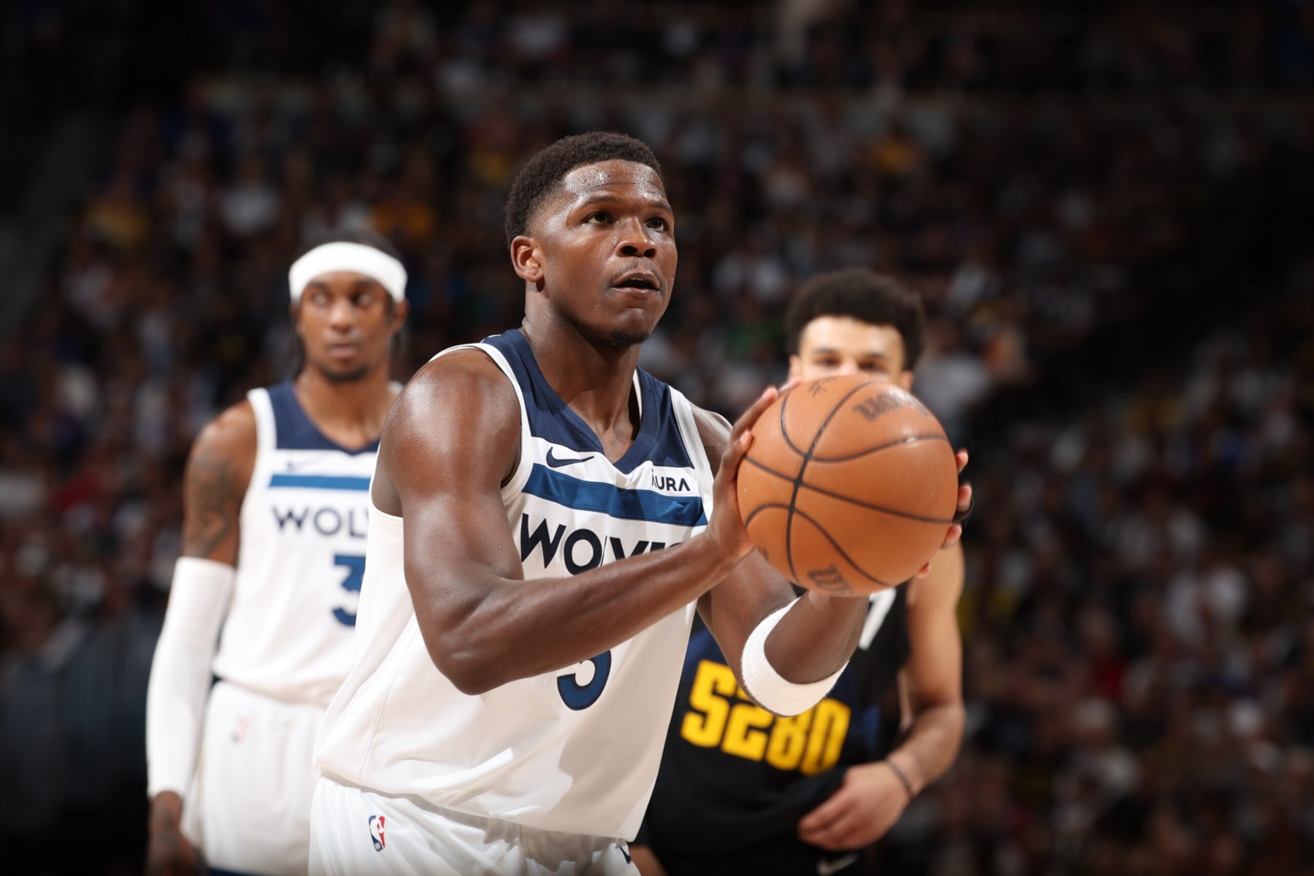 DENVER, CO - MAY 14:  Anthony Edwards #5 of the Minnesota Timberwolves shoots a free throw during the game  against the Denver Nuggets during Round 2 Game 5 of the 2024 NBA Playoffs  on May 14, 2024 at the Ball Arena in Denver, Colorado. NOTE TO USER: User expressly acknowledges and agrees that, by downloading and/or using this Photograph, user is consenting to the terms and conditions of the Getty Images License Agreement. Mandatory Copyright Notice: Copyright 2024 NBAE (Photo by David Sherman/NBAE via Getty Images)