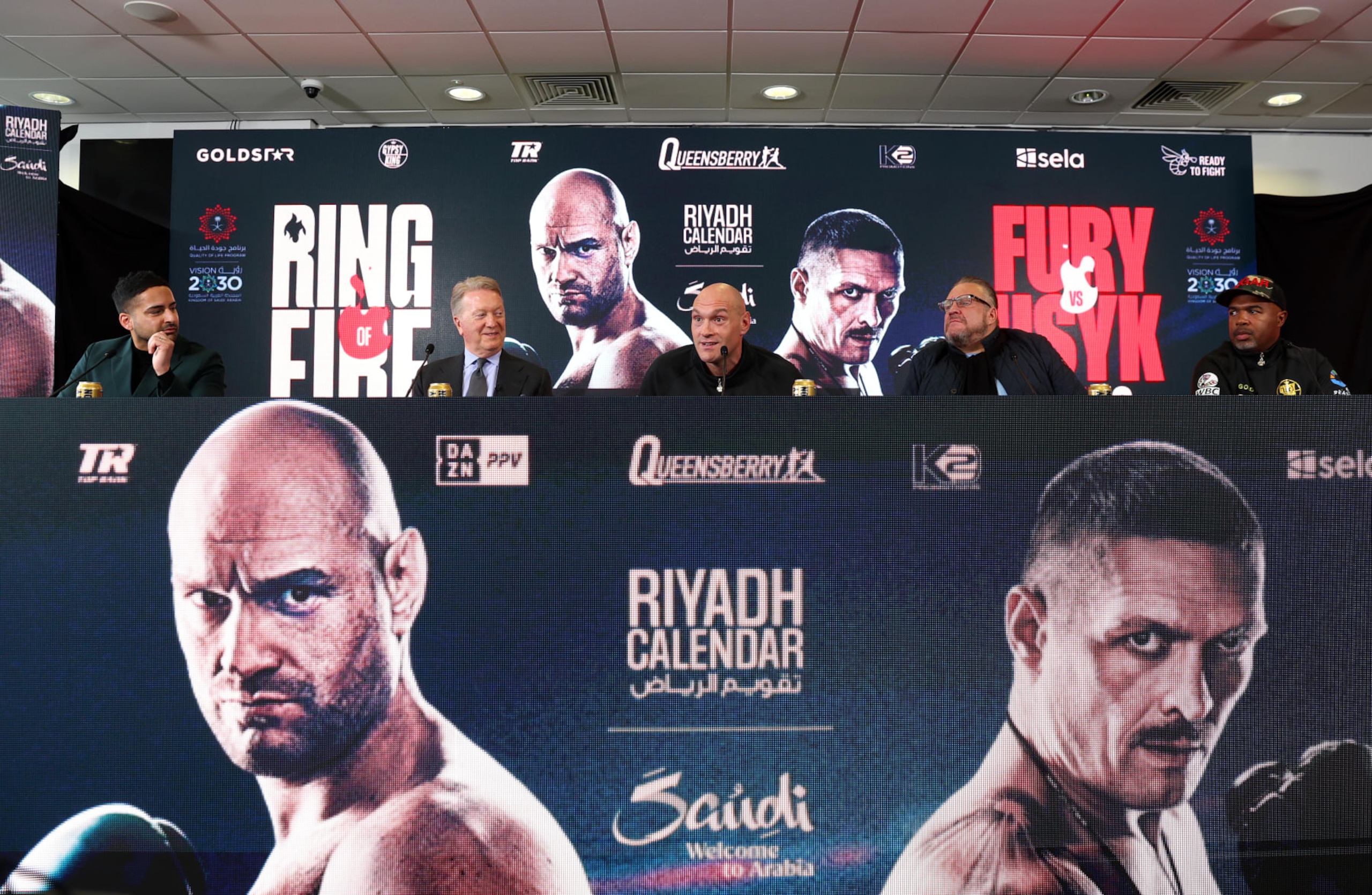 MORECAMBE, ENGLAND - APRIL 10: Boxing Promoter, Frank Warren, Tyson Fury, Spencer Brown, Manager of Tyson Fury and Founder of Gold Star Promotions and Boxing Trainer, SugarHill Steward, speak during a press conference ahead of the IBF, IBO, WBA, WBO and WBC Undisputed World Heavyweight title fight against Oleksandr Usyk on the 'Ring of Fire' card in Riyadh, Saudi Arabia at Mazuma Stadium on April 10, 2024 in Morecambe, England. (Photo by Nathan Stirk/Getty Images) MORECAMBE, ENGLAND - APRIL 10: Boxing Promoter, Frank Warren, Tyson Fury, Spencer Brown, Manager of Tyson Fury and Founder of Gold Star Promotions and Boxing Trainer, SugarHill Steward, speak during a press conference ahead of the IBF, IBO, WBA, WBO and WBC Undisputed World Heavyweight title fight against Oleksandr Usyk on the 'Ring of Fire' card in Riyadh, Saudi Arabia at Mazuma Stadium on April 10, 2024 in Morecambe, England. (Photo by Nathan Stirk/Getty Images)