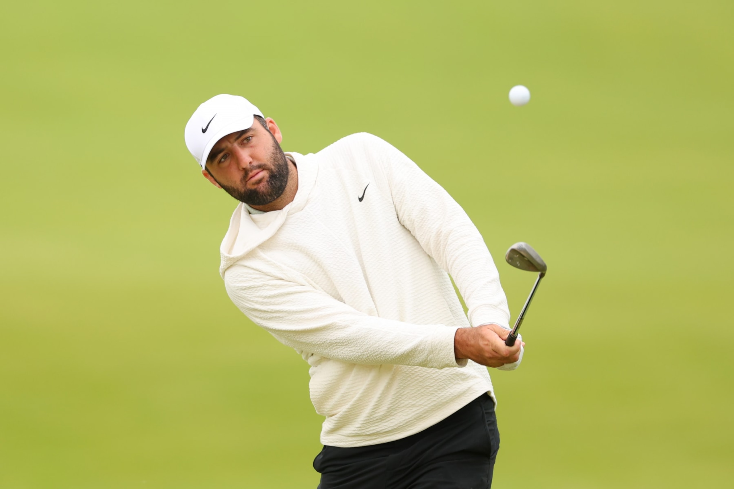 LOUISVILLE, KENTUCKY - MAY 14: Scottie Scheffler of the United States plays an approach on the first hole shot during a practice round prior to the 2024 PGA Championship at Valhalla Golf Club on May 14, 2024 in Louisville, Kentucky. (Photo by Andrew Redington/Getty Images)