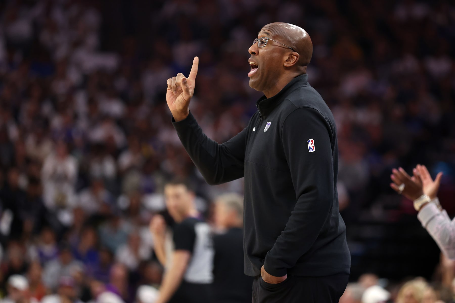 SACRAMENTO, CALIFORNIA - APRIL 16: Sacramento Kings head coach Mike Brown stands on side of court during their game against the Golden State Warriors during the Play-In Tournament at Golden 1 Center on April 16, 2024 in Sacramento, California.  NOTE TO USER: User expressly acknowledges and agrees that, by downloading and or using this photograph, User is consenting to the terms and conditions of the Getty Images License Agreement.  (Photo by Ezra Shaw/Getty Images)