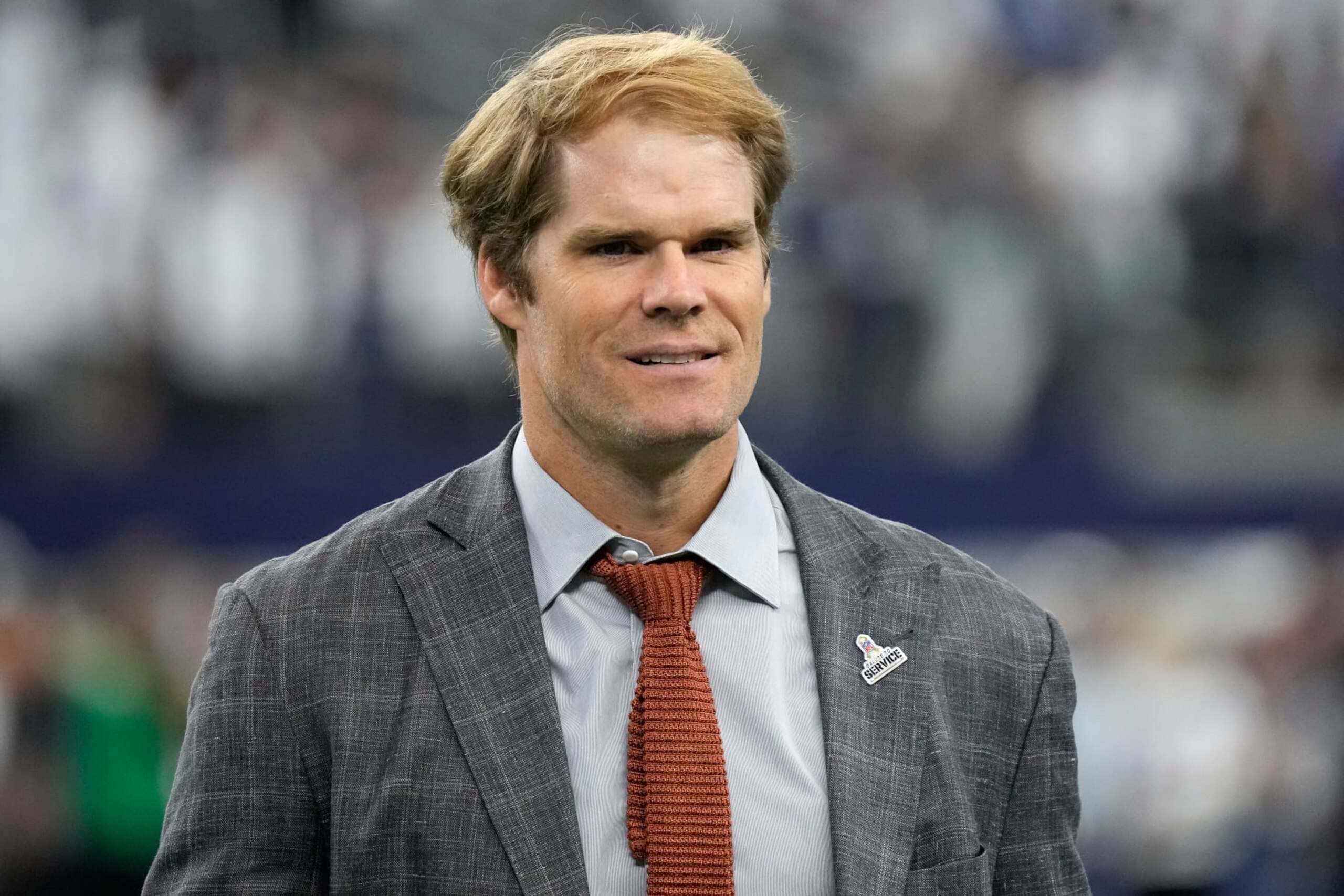 ARLINGTON, TEXAS - NOVEMBER 12: Broadcaster Greg Olsen walks the field before the game between the New York Giants and the Dallas Cowboys at AT&T Stadium on November 12, 2023 in Arlington, Texas. (Photo by Sam Hodde/Getty Images)