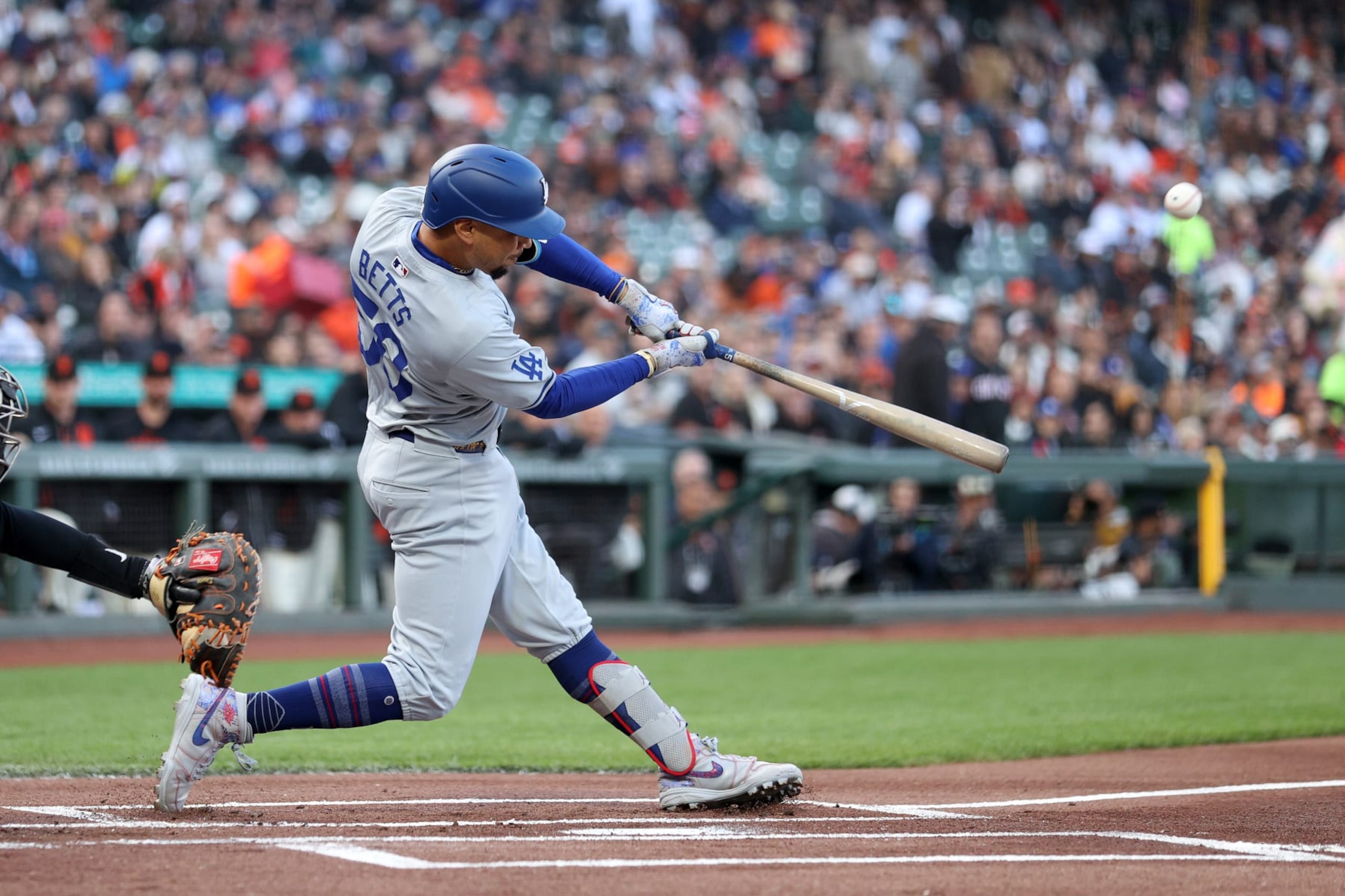 SAN FRANCISCO, CALIFORNIA - MAY 13:  Mookie Betts #50 of the Los Angeles Dodgers hits a lead off home run against the San Francisco Giants in the first inning at Oracle Park on May 13, 2024 in San Francisco, California. (Photo by Ezra Shaw/Getty Images)