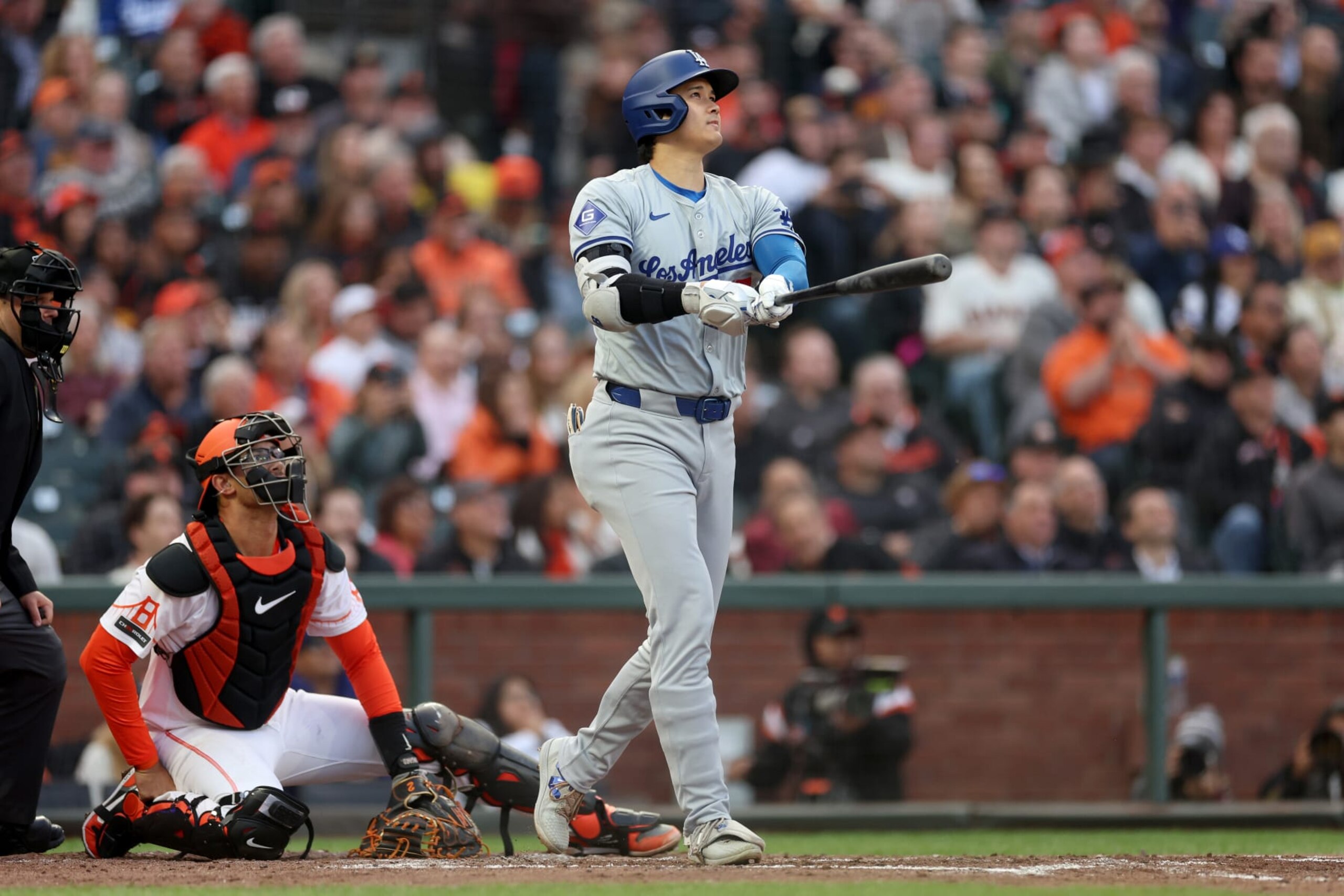 SAN FRANCISCO, CALIFORNIA - MAY 14: Shohei Ohtani #17 of the Los Angeles Dodgers hits a home run against the San Francisco Giants in the fourth inning at Oracle Park on May 14, 2024 in San Francisco, California. (Photo by Ezra Shaw/Getty Images)