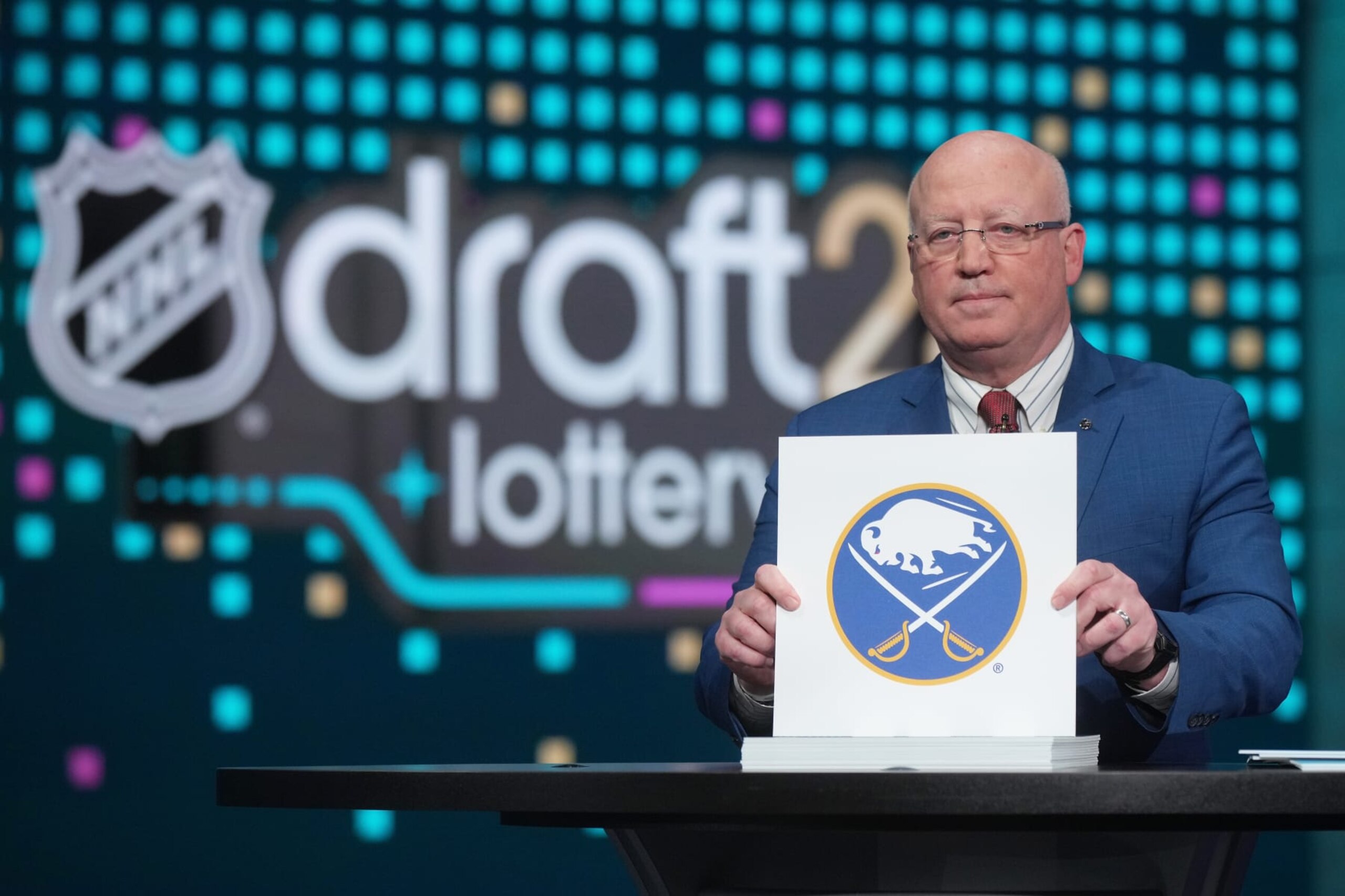 SECAUCUS, NEW JERSEY - MAY 07: National Hockey League Deputy Commissioner Bill Daly announces the Buffalo Sabres #11 overall draft position during the 2024 NHL Draft Lottery at NHL Network Studio on May 07, 2024 in Secaucus, New Jersey.  (Photo by Mike Stobe/NHLI via Getty Images)