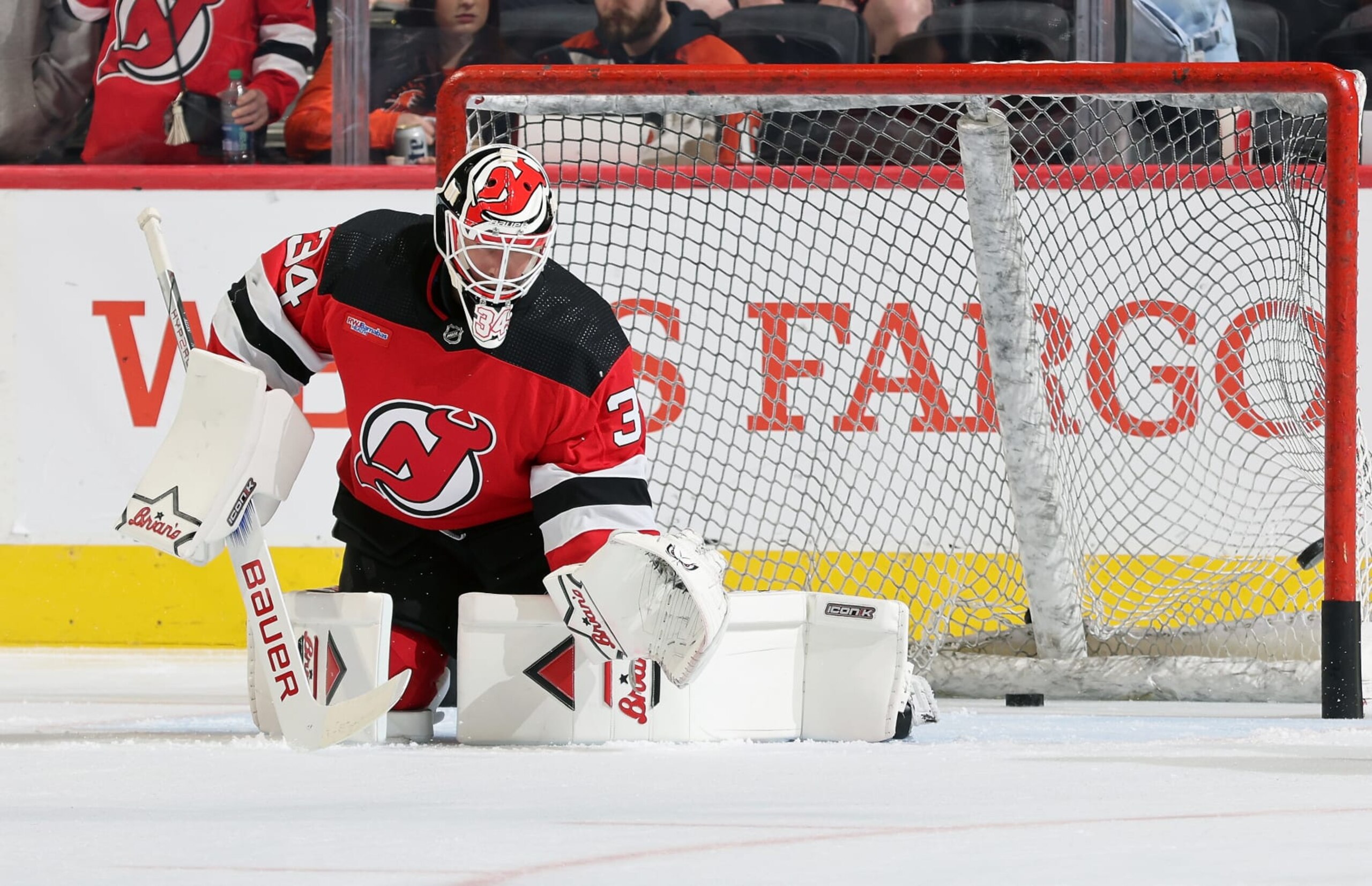 PHILADELPHIA, PENNSYLVANIA - APRIL 13:  Jake Allen #34 of the New Jersey Devils takes shots on goal during warm-ups prior to his game against the Philadelphia Flyers at the Wells Fargo Center on April 13, 2024 in Philadelphia, Pennsylvania.  (Photo by Len Redkoles/NHLI via Getty Images)