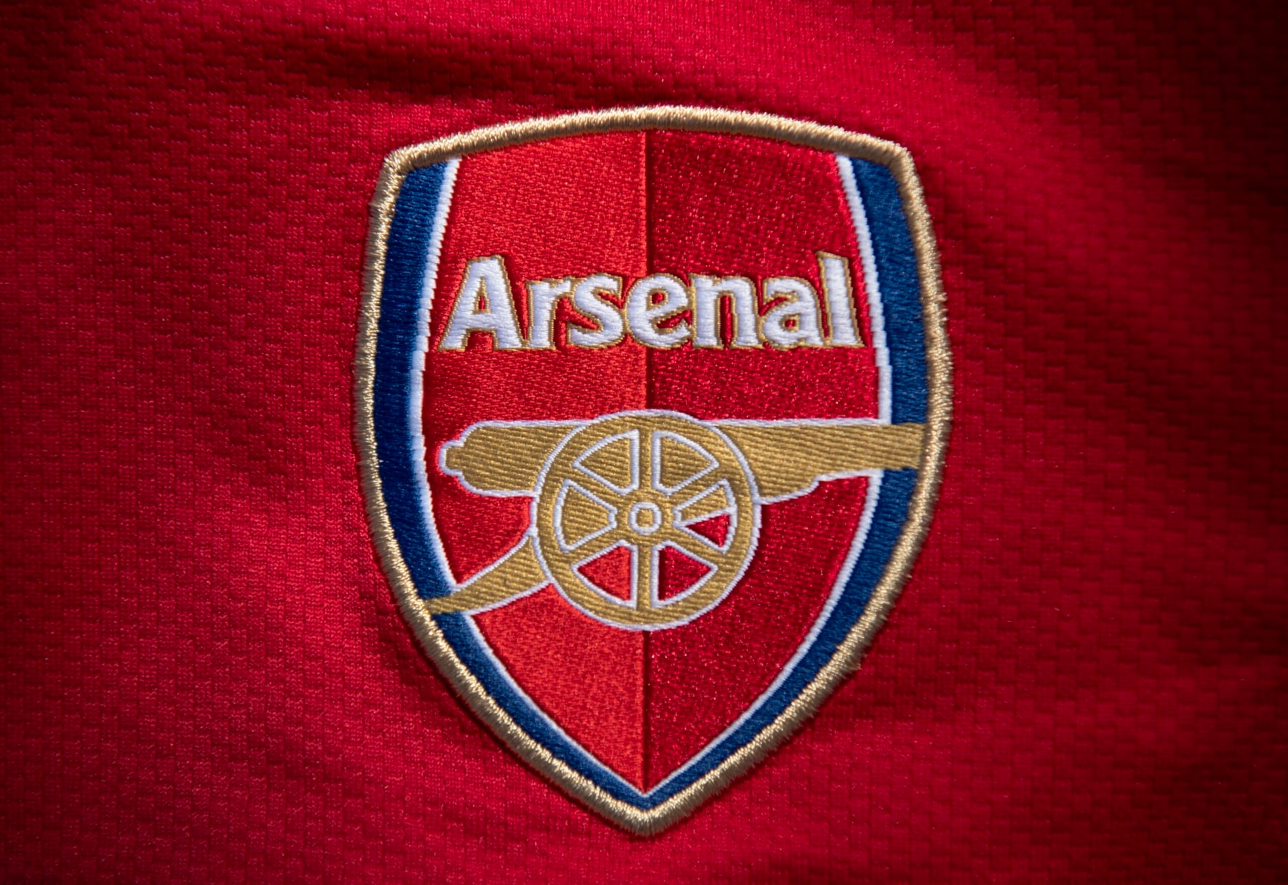MANCHESTER, ENGLAND - MAY 06: The Arsenal club crest on the first team home shirt displayed on May 6, 2020 in Manchester, England (Photo by Visionhaus)