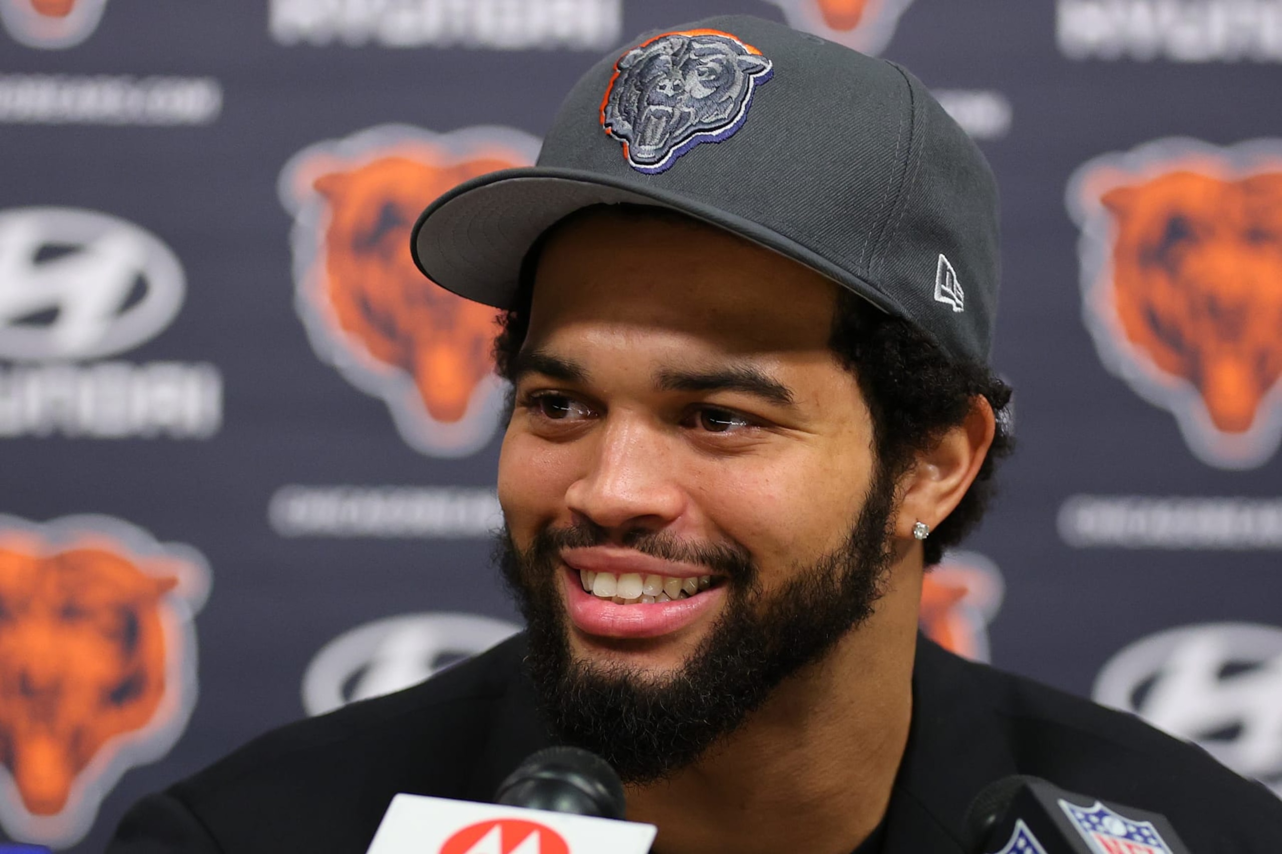 LAKE FOREST, ILLINOIS - APRIL 26: Caleb Williams #18 of the Chicago Bears speaks answers a question from the media during his introductory press conference at Halas Hall on April 26, 2024 in Lake Forest, Illinois. Caleb Williams was drafted first overall in the 2024 NFL Draft on Thursday. (Photo by Michael Reaves/Getty Images)