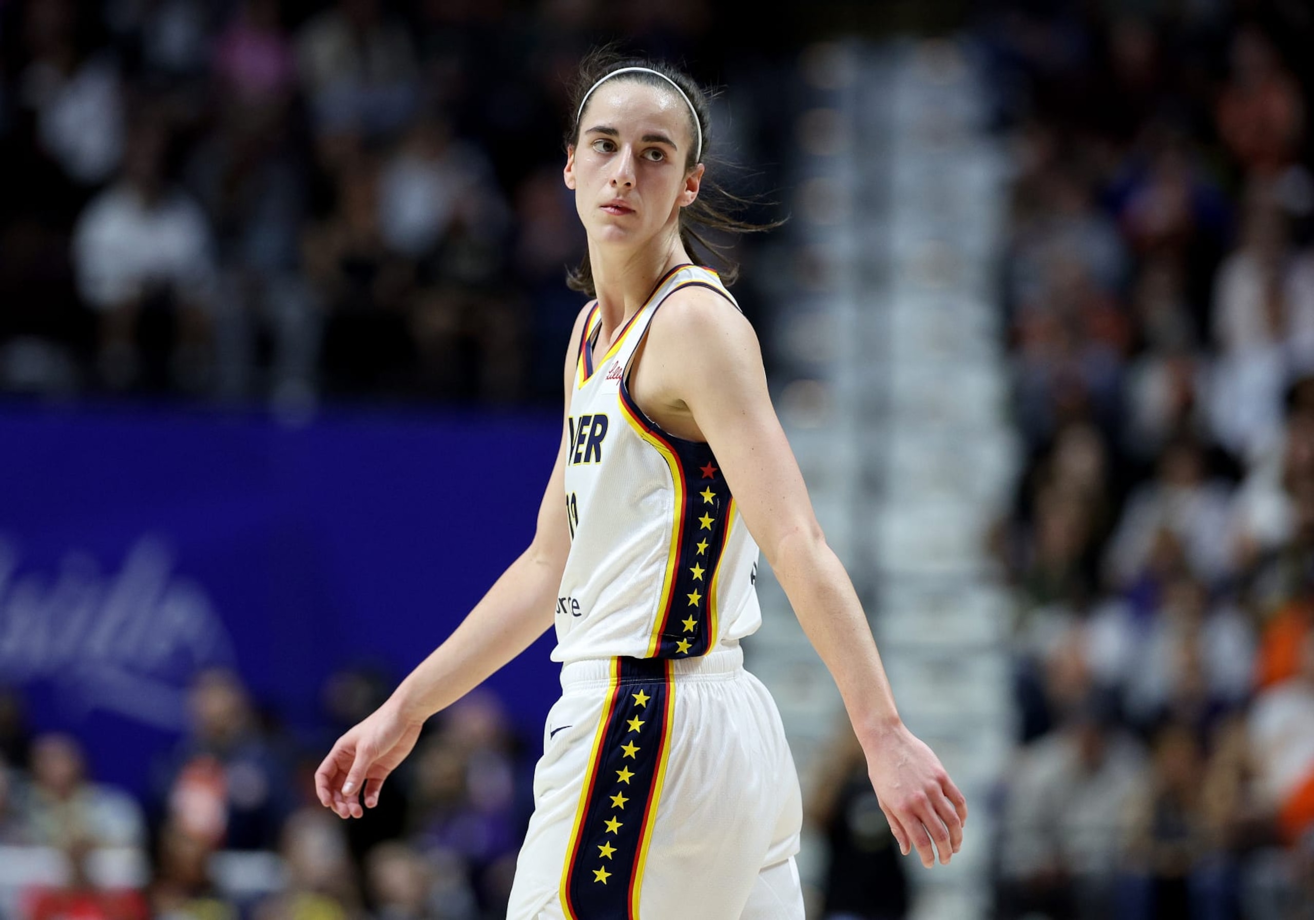UNCASVILLE, CONNECTICUT - MAY 14:  Caitlin Clark #22 of the Indiana Fever reacts in the second half against the Connecticut Sun at Mohegan Sun Arena on May 14, 2024 in Uncasville, Connecticut. The Connecticut Sun defeated the Indiana Fever 92-71. NOTE TO USER: User expressly acknowledges and agrees that, by downloading and or using this photograph, User is consenting to the terms and conditions of the Getty Images License Agreement. (Photo by Elsa/Getty Images)