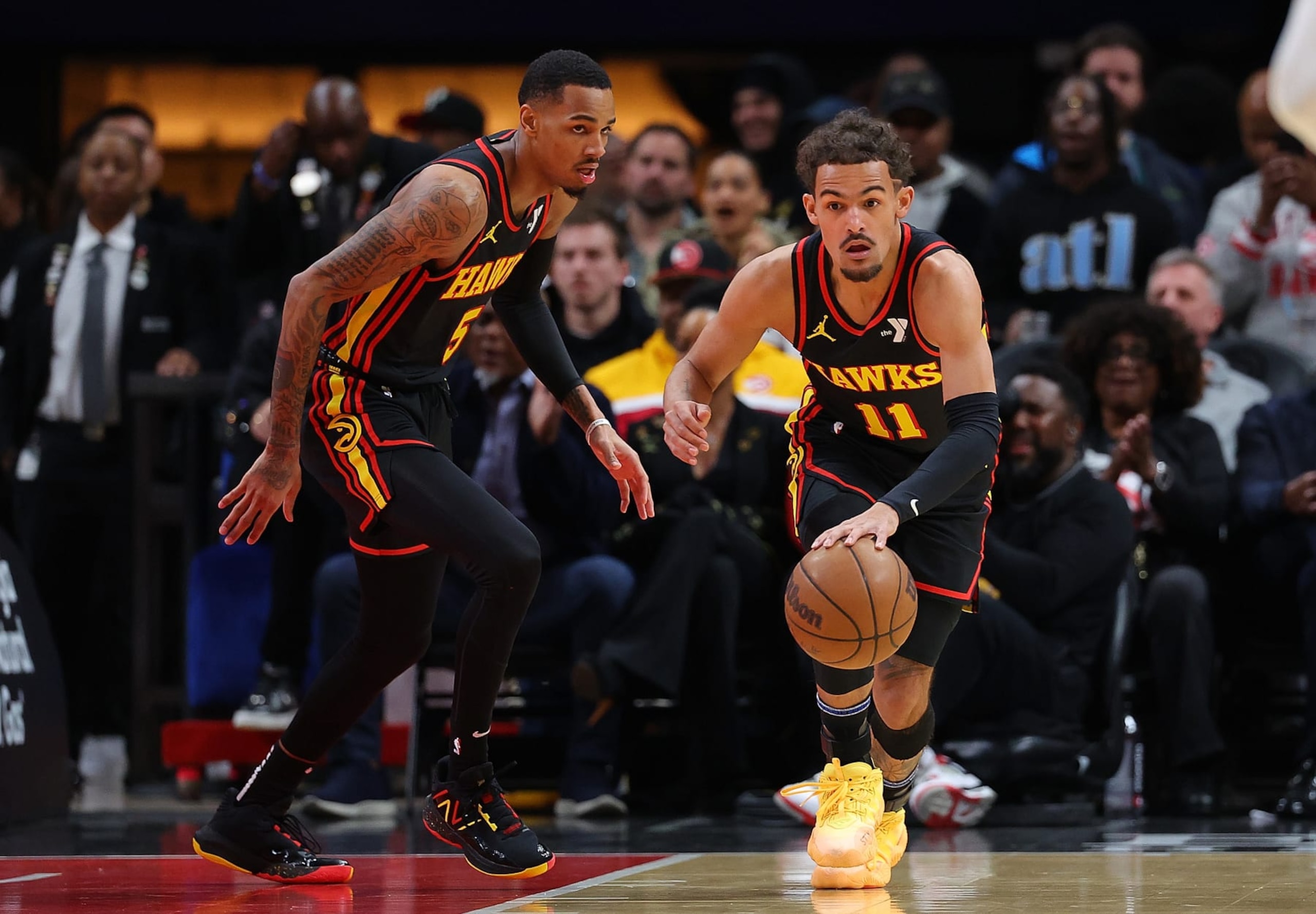ATLANTA, GEORGIA - FEBRUARY 05:  Trae Young #11 of the Atlanta Hawks drives the ball against the LA Clippers during the first quarter at State Farm Arena on February 05, 2024 in Atlanta, Georgia.  NOTE TO USER: User expressly acknowledges and agrees that, by downloading and/or using this photograph, user is consenting to the terms and conditions of the Getty Images License Agreement.  (Photo by Kevin C. Cox/Getty Images)
