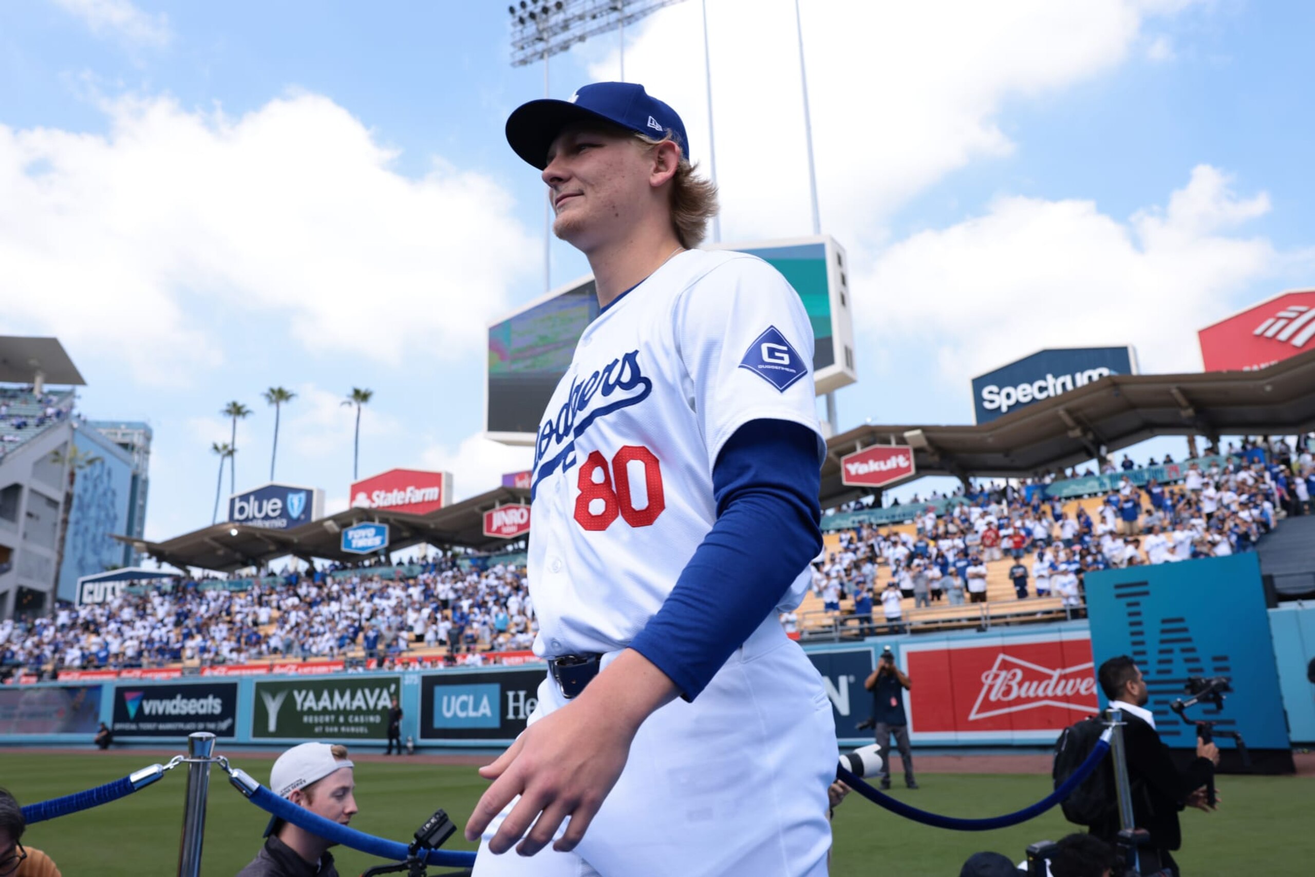 LOS ANGELES, CA - MARCH 28:  Emmet Sheehan #80 of the Los Angeles Dodgers walks onto the field during the game between the St. Louis Cardinals and the Los Angeles Dodgers at Dodger Stadium on Thursday, March 28, 2024 in Los Angeles, California. (Photo by Katelyn Mulcahy/MLB Photos via Getty Images)