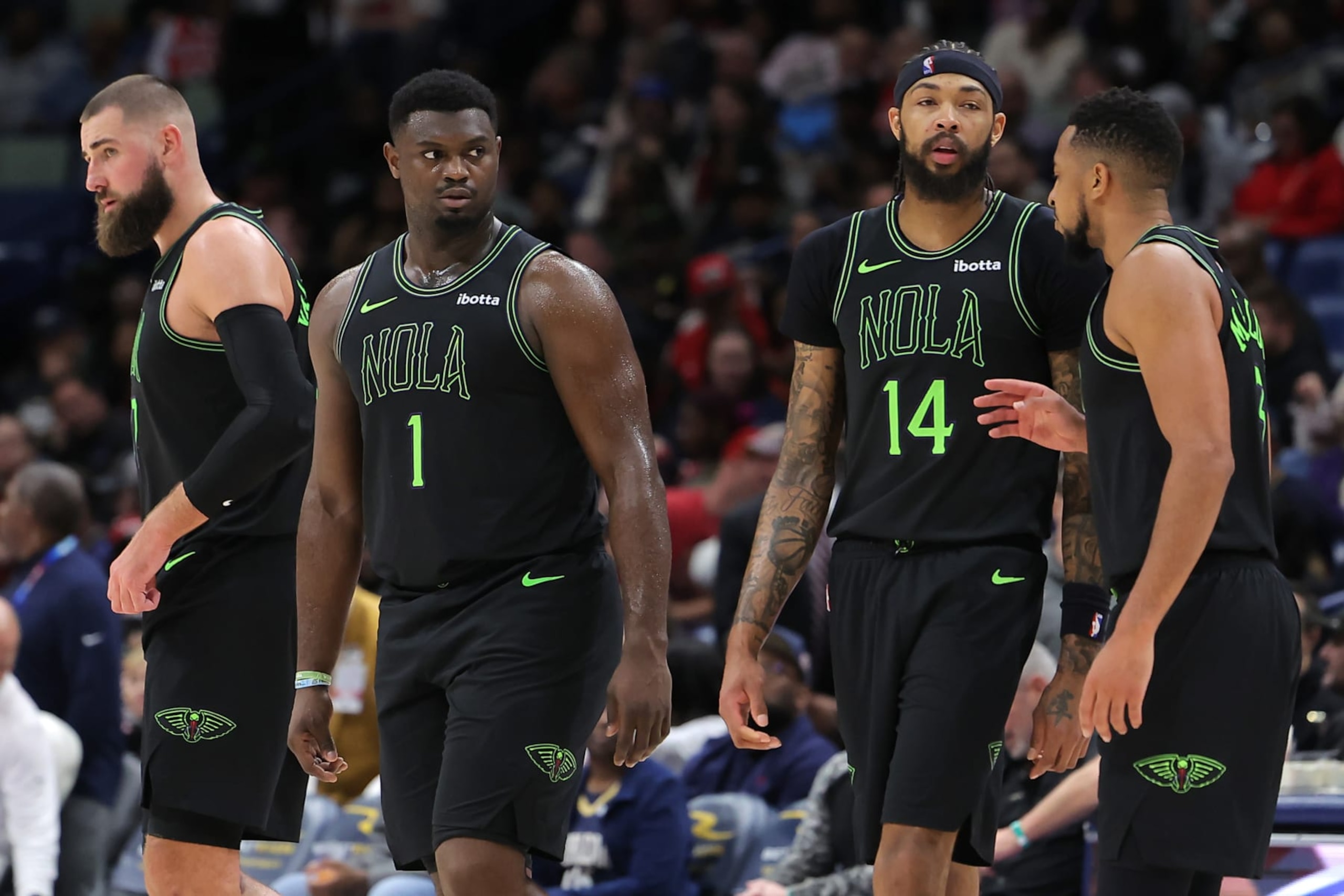 NEW ORLEANS, LOUISIANA - DECEMBER 01: Zion Williamson #1, CJ McCollum #3, Brandon Ingram #14 and Jonas Valanciunas #17 of the New Orleans Pelicans react during a game against the San Antonio Spurs at the Smoothie King Center on December 01, 2023 in New Orleans, Louisiana. NOTE TO USER: User expressly acknowledges and agrees that, by downloading and or using this Photograph, user is consenting to the terms and conditions of the Getty Images License Agreement. (Photo by Jonathan Bachman/Getty Images)