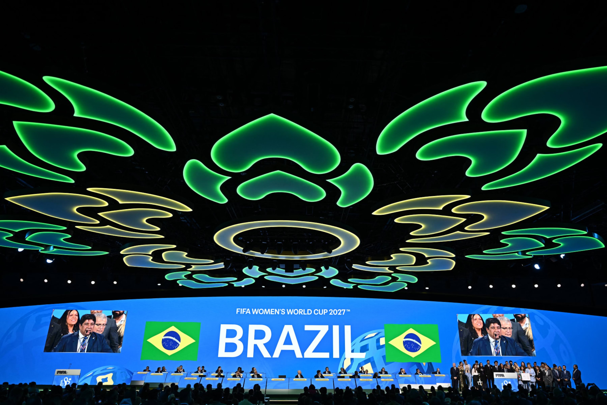 TOPSHOT - Brazil is announced as the host of the 2027 Women's World Cup during the 74th FIFA Congress in Bangkok on May 17, 2024. The 74th FIFA Congress is taking place in Bangkok with member associations voting on a range of issues including confirmation of the host nation or nations for the 2027 women's football World Cup. (Photo by Manan VATSYAYANA / AFP) (Photo by MANAN VATSYAYANA/AFP via Getty Images)