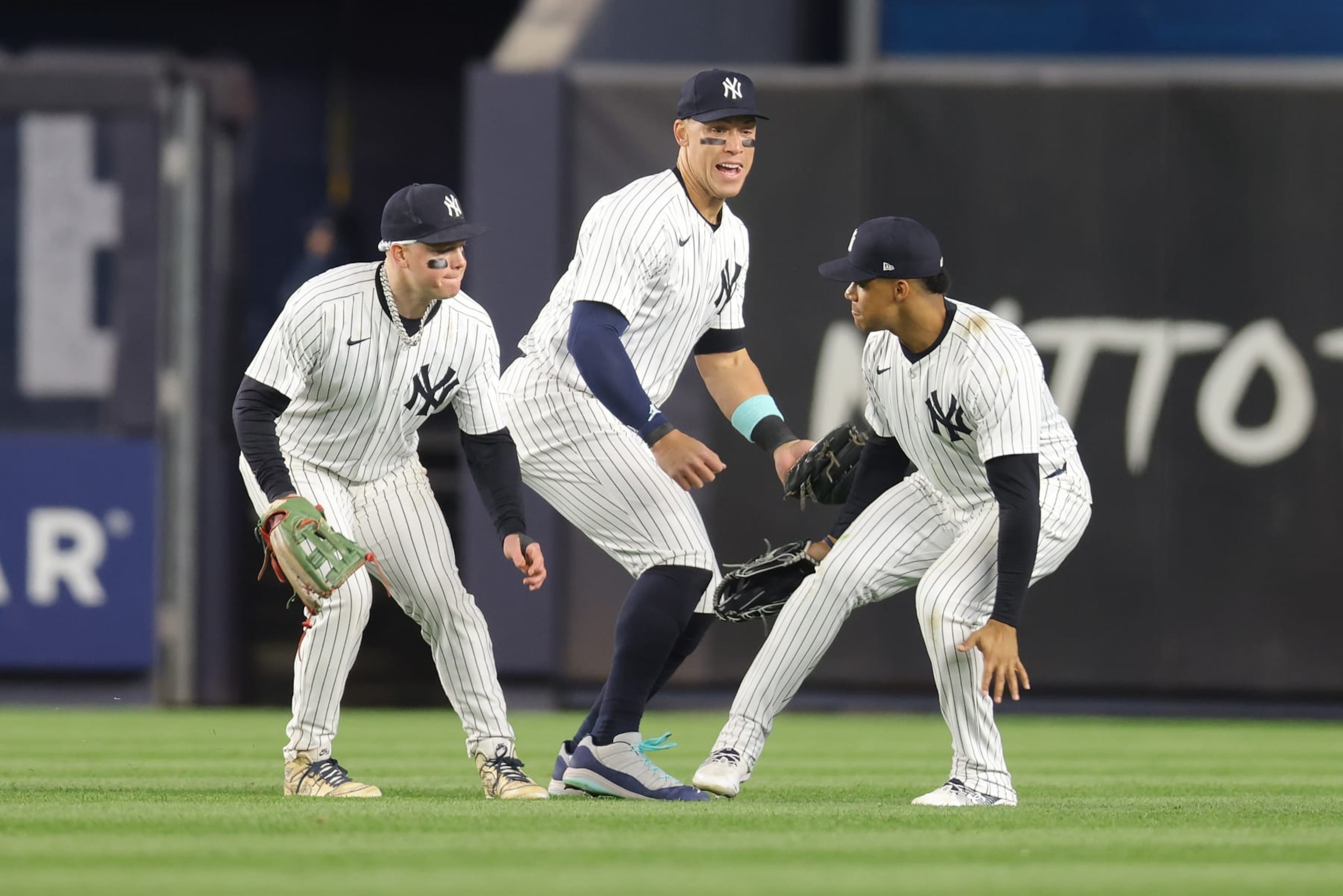 NEW YORK, NEW YORK - APRIL 23: Juan Soto #22, Aaron Judge #99 and Alex Verdugo #24 of the New York Yankees celebrate after defeating the Oakland Athletics 4-3 at Yankee Stadium on April 23, 2024 in New York City. (Photo by Mike Stobe/Getty Images)