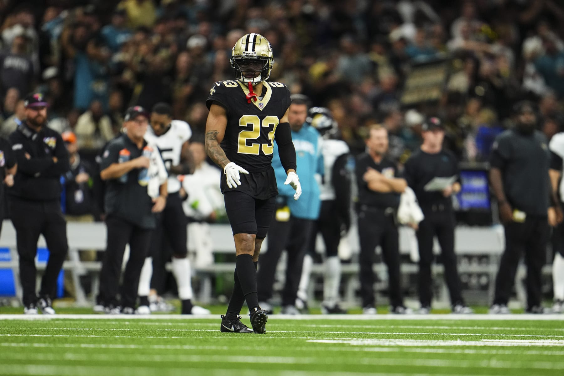 NEW ORLEANS, LA - OCTOBER 19: Marshon Lattimore #23 of the New Orleans Saints looks on from the field during an NFL football game against the Jacksonville Jaguars at Caesars Superdome on October 19, 2023 in New Orleans, Louisiana. (Photo by Cooper Neill/Getty Images)