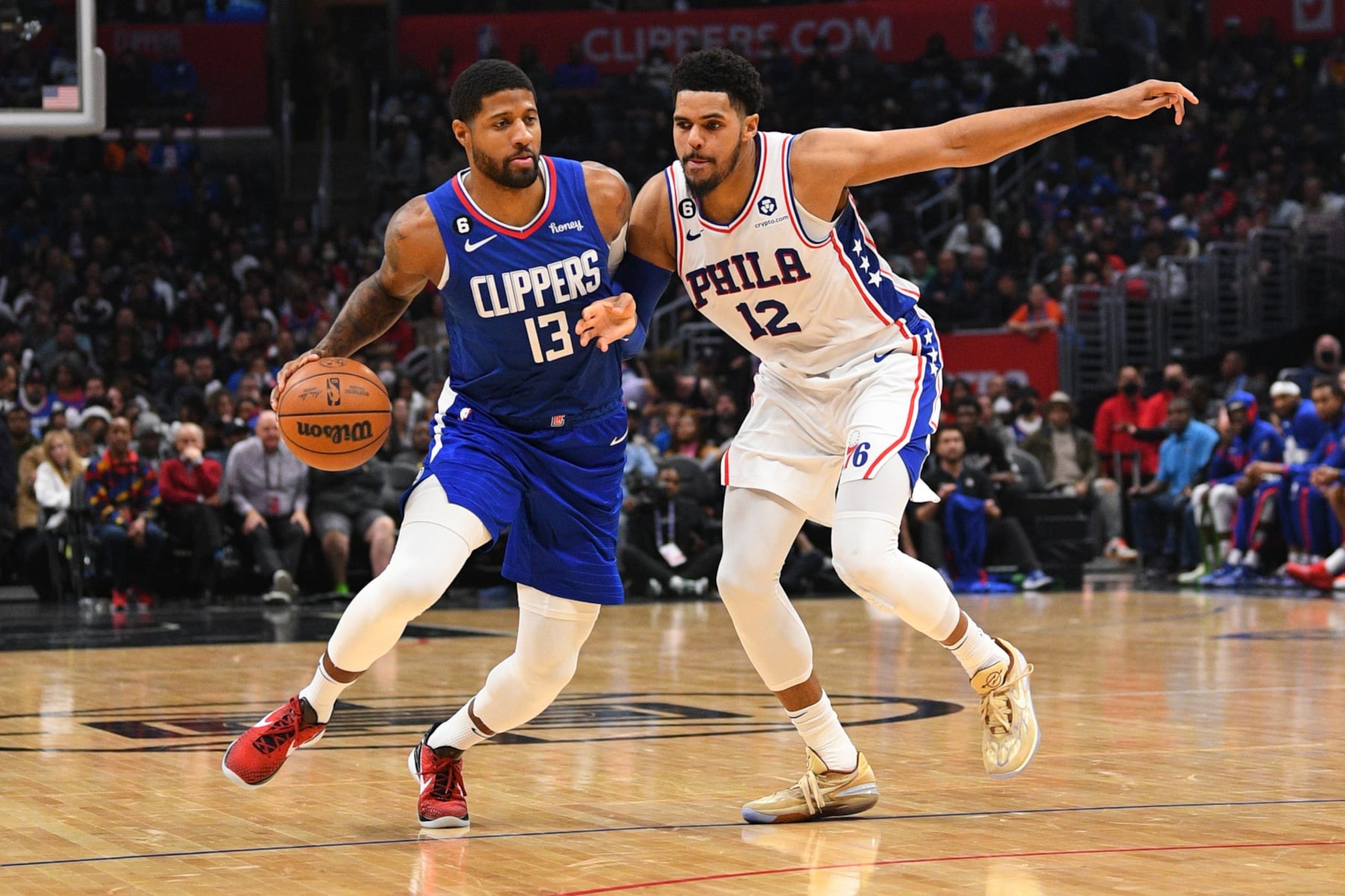 Paul George and Tobias Harris