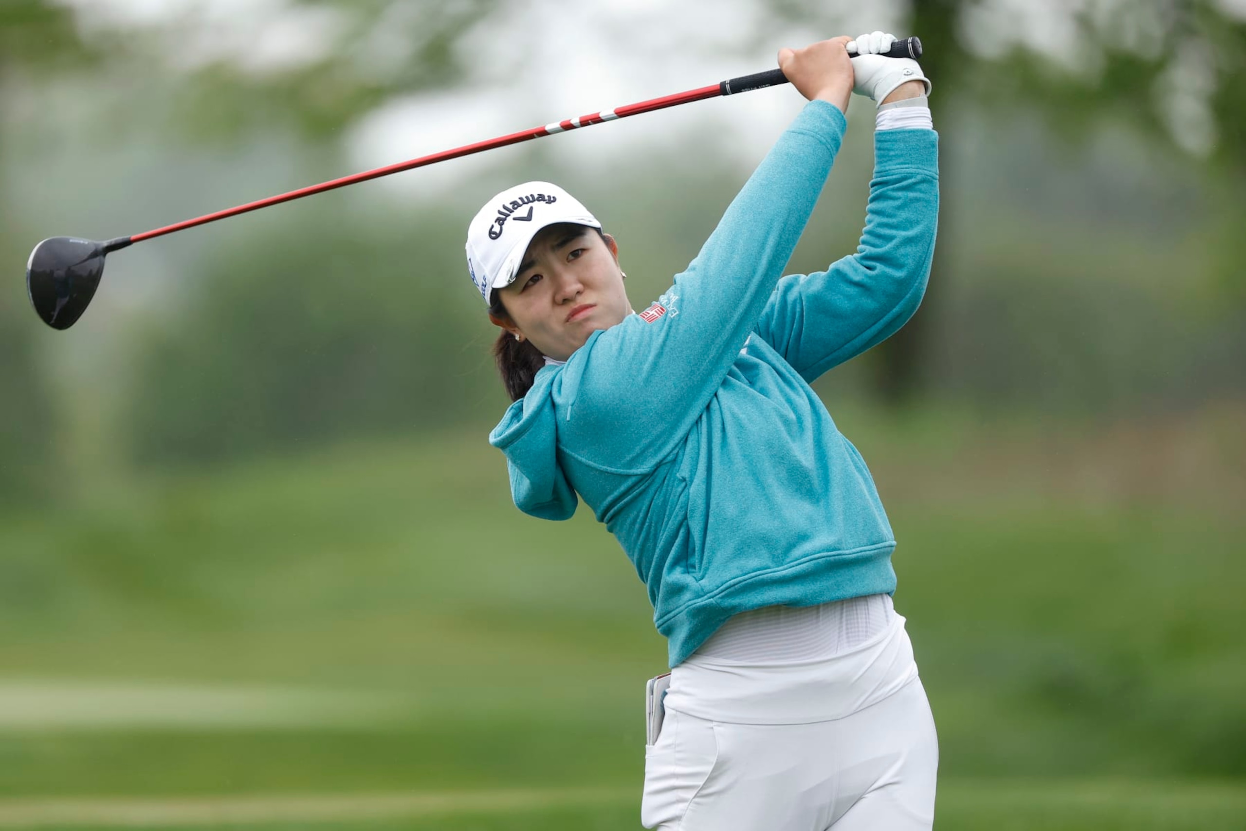 JERSEY CITY, NEW JERSEY - MAY 16: Rose Zhang of the United States plays her shot from the 13th tee during the first round of the Mizuho Americas Open at Liberty National Golf Club on May 16, 2024 in Jersey City, New Jersey. (Photo by Sarah Stier/Getty Images)
