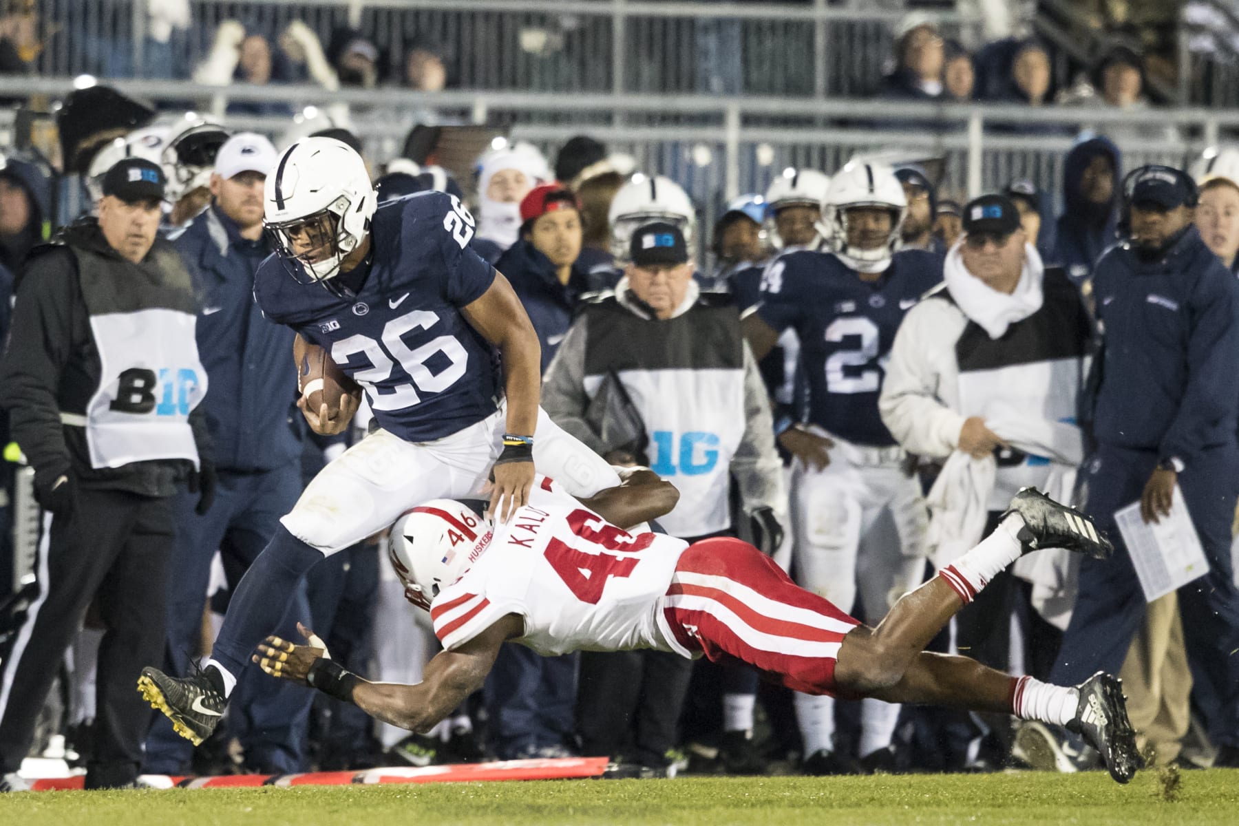 UNIVERSITY PARK, PA - NOVEMBER 18:  Saquon Barkley #26 of the Penn State Nittany Lions is forced out of bounds by Joshua Kalu #46 of the Nebraska Cornhuskers on November 18, 2017 at Beaver Stadium in University Park, Pennsylvania.  (Photo by Brett Carlsen/Getty Images)