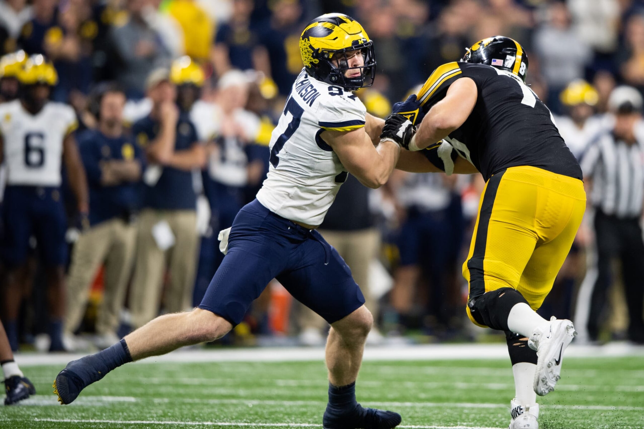 INDIANAPOLIS, IN - DECEMBER 04: Michigan Wolverines defensive end Aidan Hutchinson (97) rushes against Iowa Hawkeyes offensive lineman Mason Richman (78) during the Big 10 Championship game between the Michigan Wolverines and Iowa Hawkeyes on December 4, 2021, at Lucas Oil Stadium in Indianapolis, IN. (Photo by Zach Bolinger/Icon Sportswire via Getty Images)