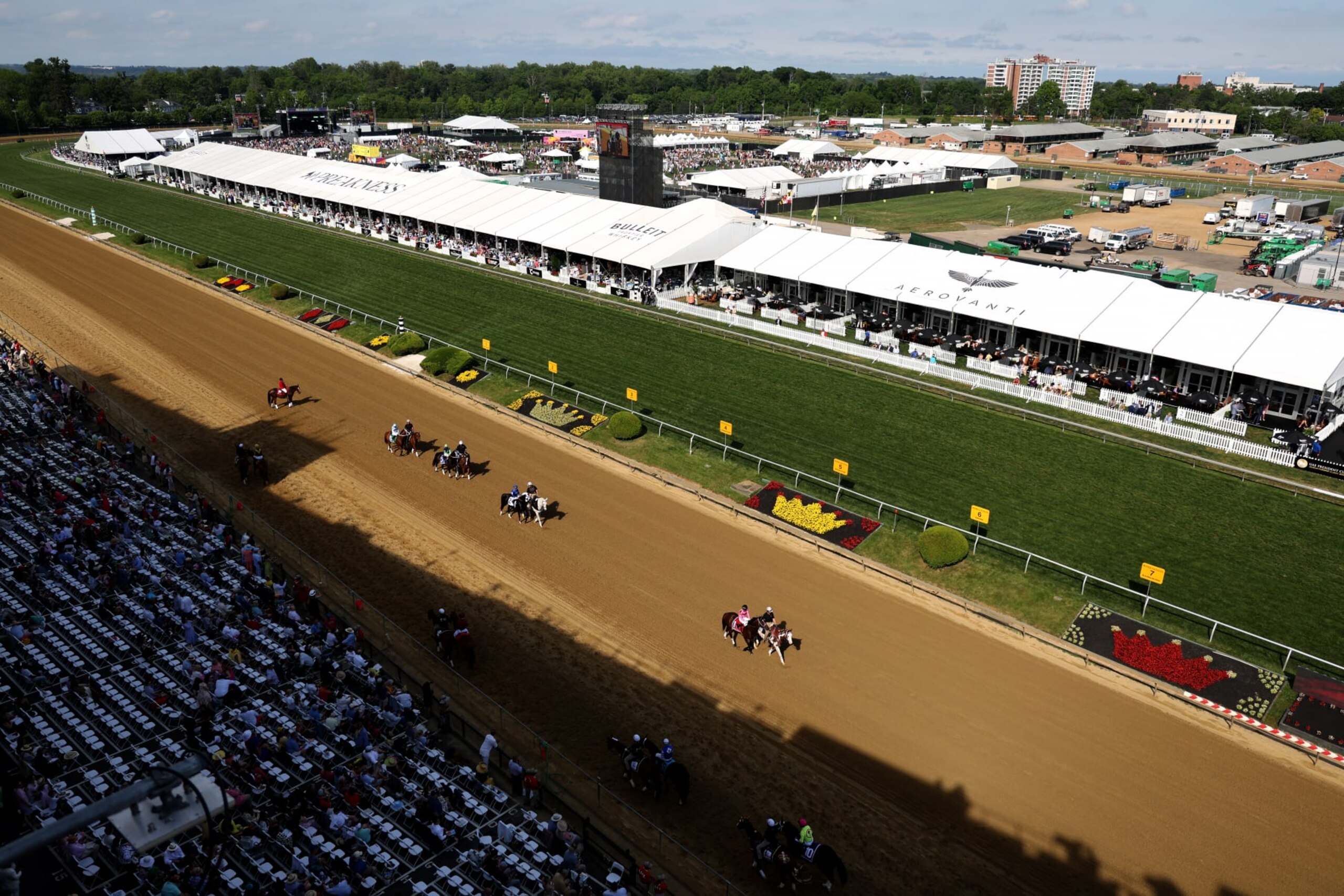 BALTIMORE, MARYLAND - MAY 20: The field heads to the starting gate before the start of the tenth race ahead of the 148th Running of the Preakness Stakes at Pimlico Race Course on May 20, 2023 in Baltimore, Maryland. (Photo by Rob Carr/Getty Images) BALTIMORE, MARYLAND - MAY 20: The field heads to the starting gate before the start of the tenth race ahead of the 148th Running of the Preakness Stakes at Pimlico Race Course on May 20, 2023 in Baltimore, Maryland. (Photo by Rob Carr/Getty Images)