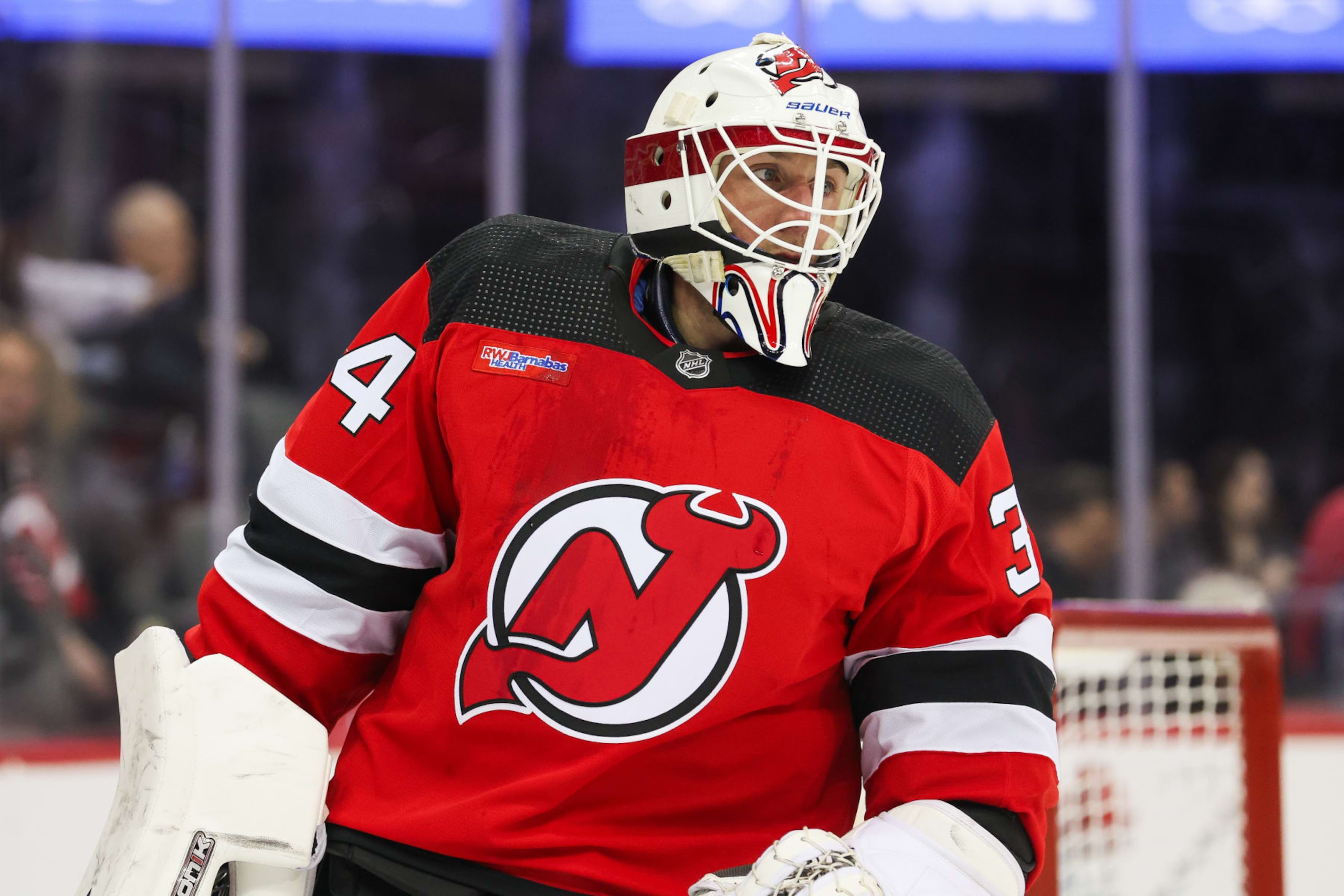 NEWARK, NJ - MARCH 21: New Jersey Devils goaltender Jake Allen (34) looks on during a game between the Winnipeg Jets and New Jersey Devils on March 21, 2024 at Prudential Center in the Newark, New Jersey. (Photo by Andrew Mordzynski/Icon Sportswire via Getty Images)