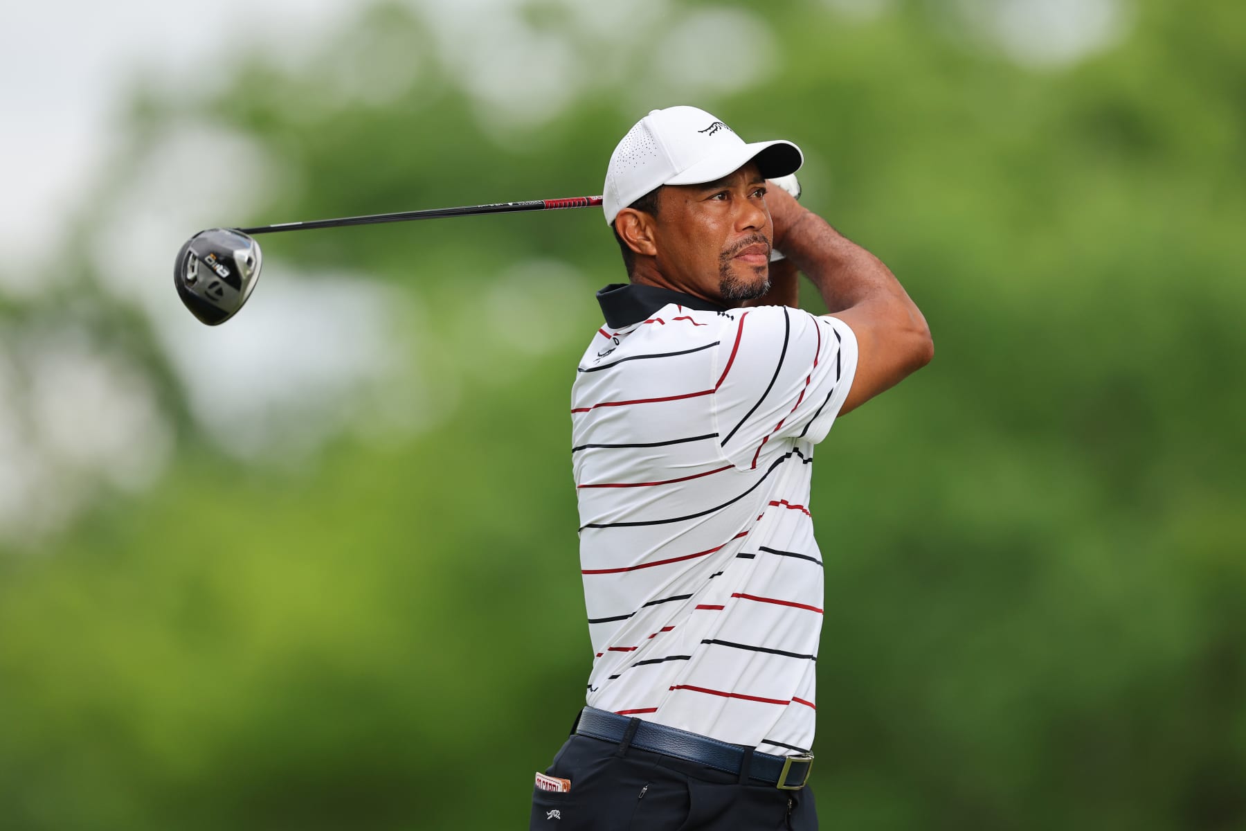 LOUISVILLE, KENTUCKY - MAY 17: Tiger Woods of the United States plays a shot on the 11th hole during the second round of the 2024 PGA Championship at Valhalla Golf Club on May 17, 2024 in Louisville, Kentucky. (Photo by Michael Reaves/Getty Images)