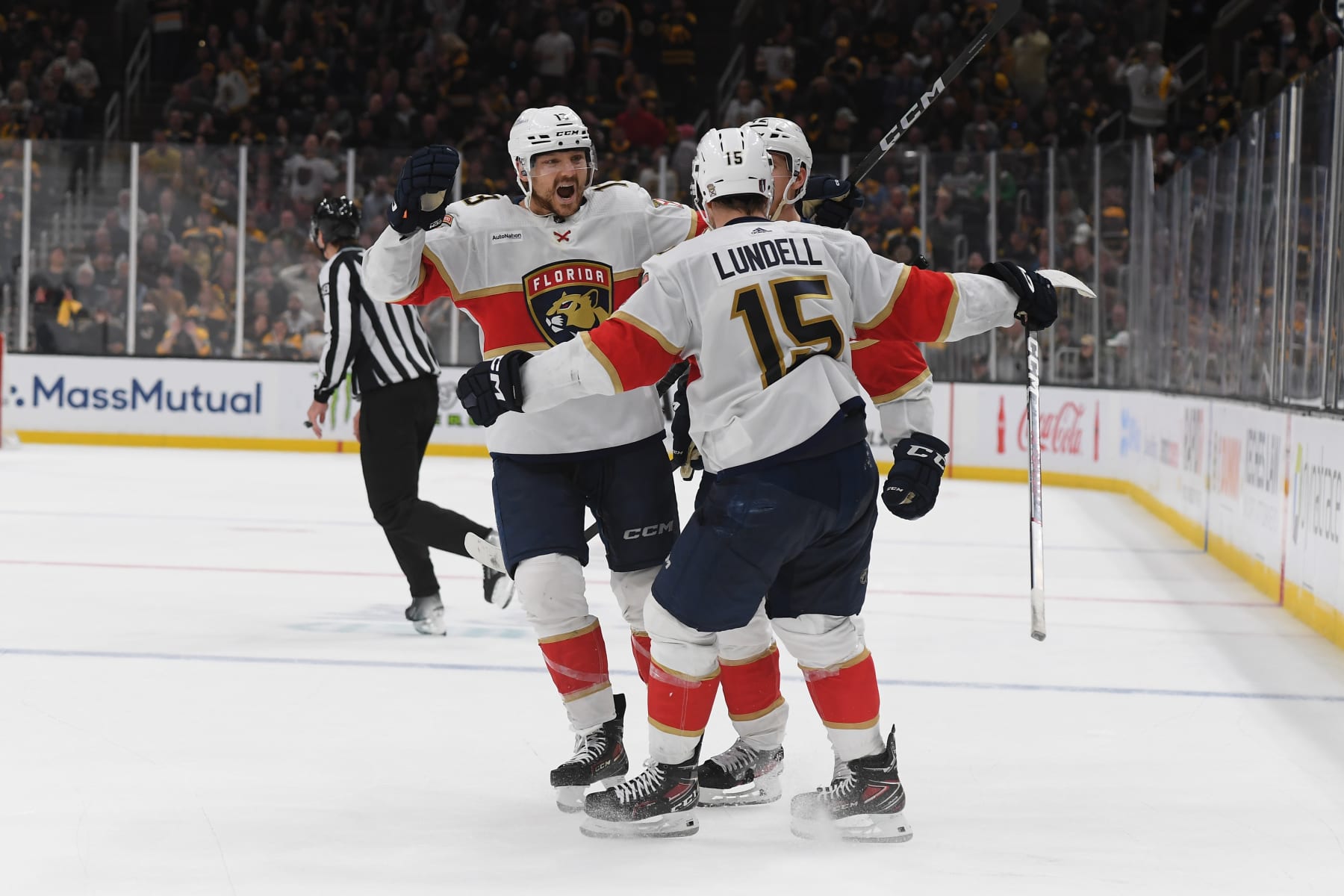 BOSTON, MASSACHUSETTS - MAY 17: Sam Reinhart #13, Gustav Forsling #42 and Anton Lundell #15 of the Florida Panthers celebrate the third-period goal against the Boston Bruins in Game Six of the Second Round of the 2024 Stanley Cup Playoffs at the TD Garden on May 17, 2024 in Boston, Massachusetts. (Photo by Steve Babineau/NHLI via Getty Images)