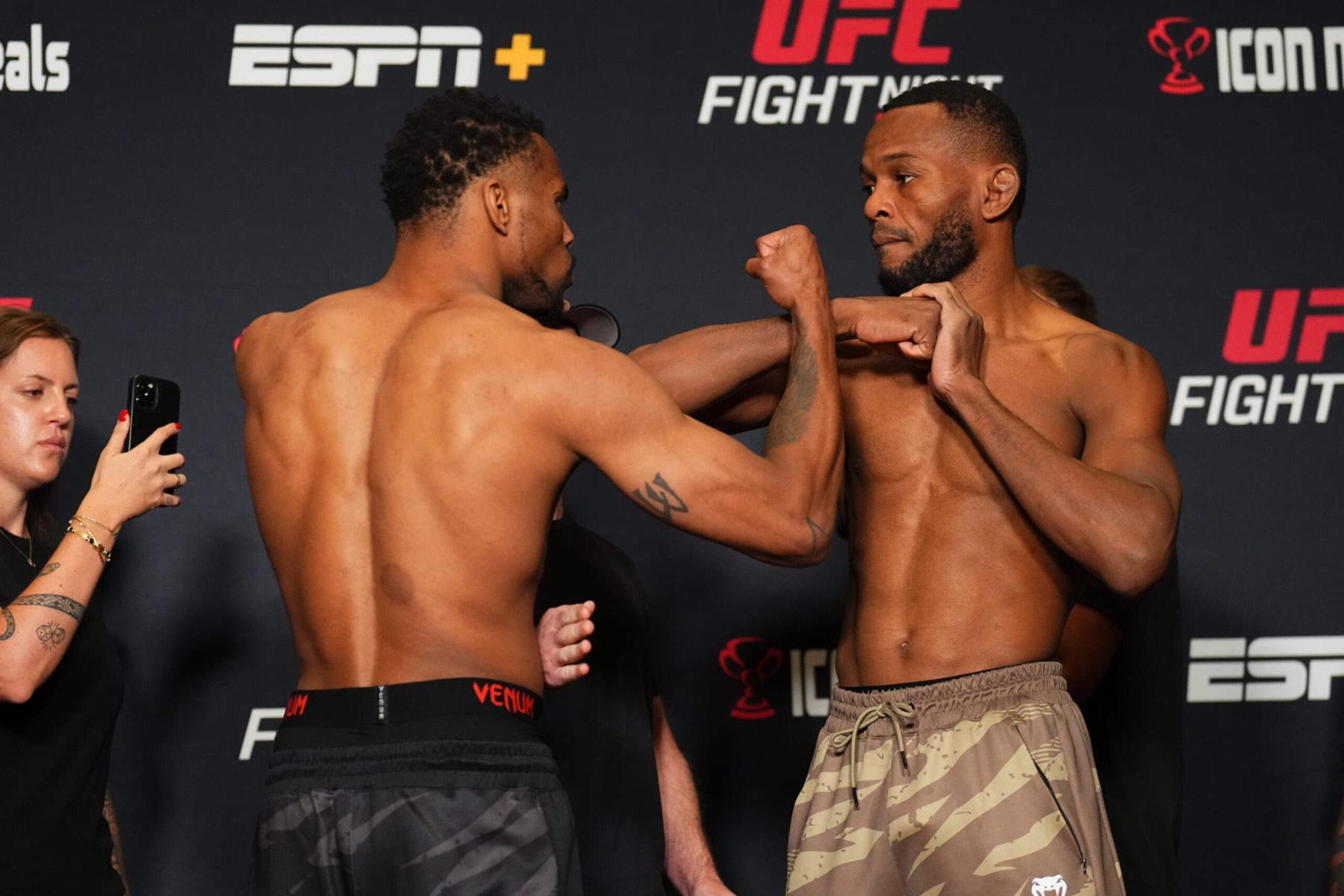 Opponents Khaos Williams and Carlston Harris square off.