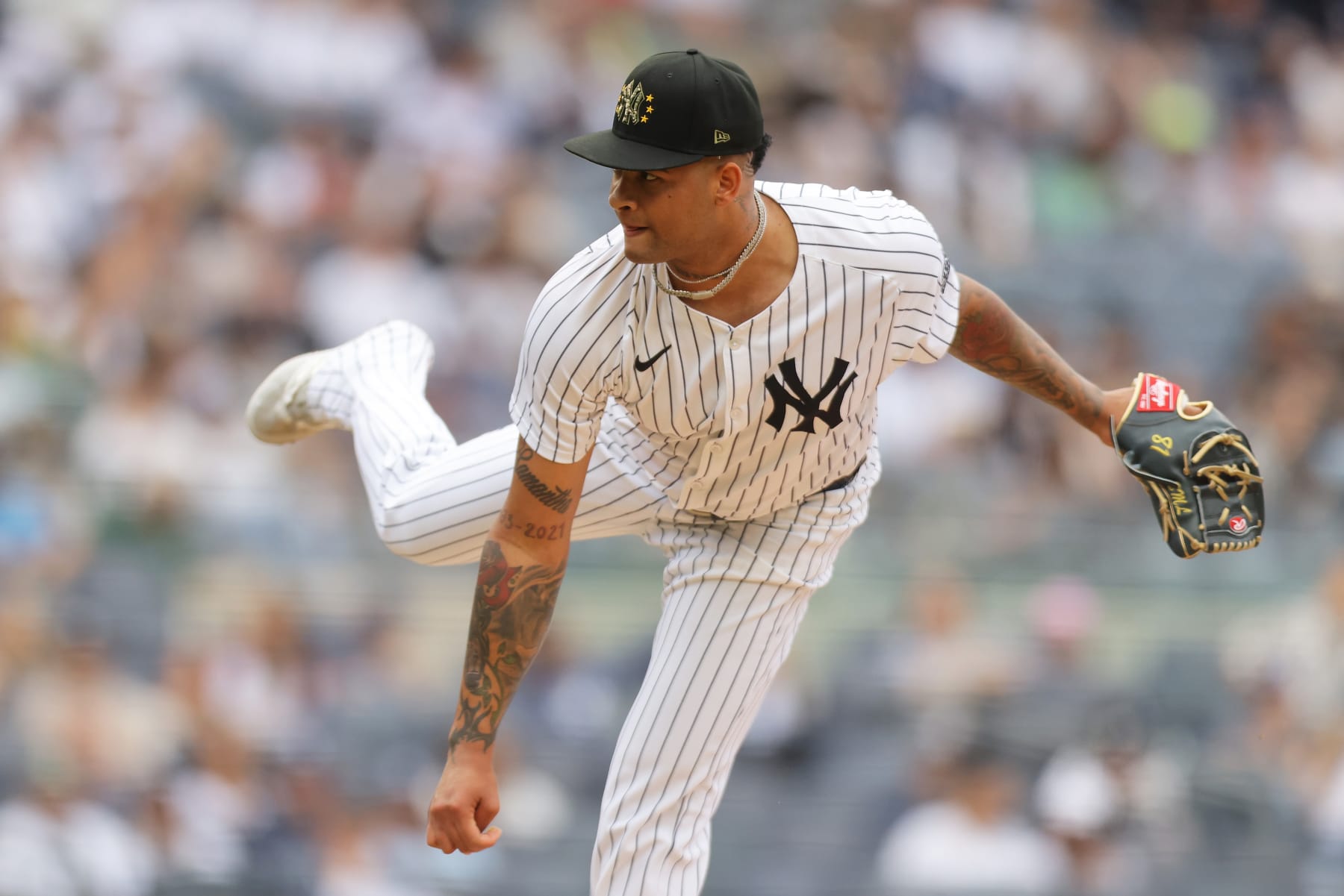 NEW YORK, NEW YORK - MAY 18: Luis Gil #81 of the New York Yankees pitches in the first inning against the Chicago White Sox at Yankee Stadium on May 18, 2024 in New York City. (Photo by Mike Stobe/Getty Images)