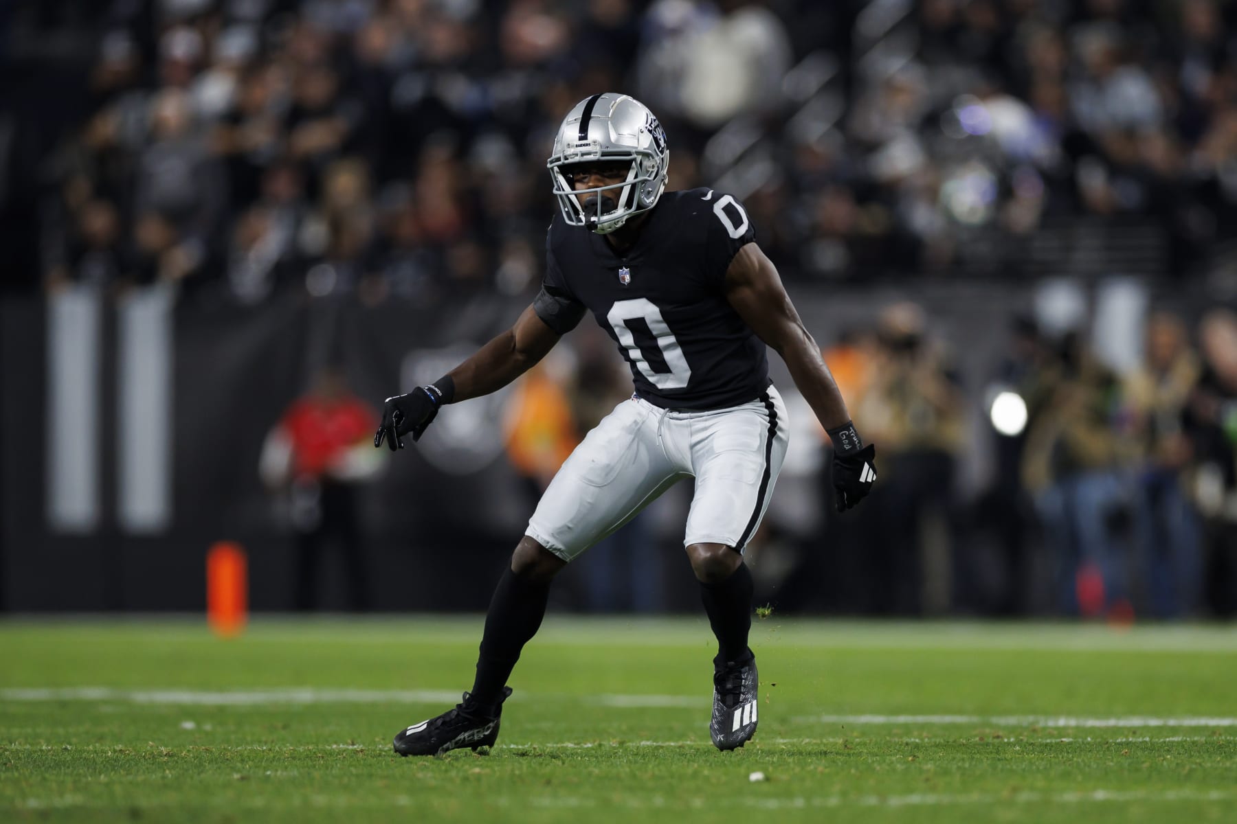 LAS VEGAS, NEVADA - DECEMBER 14: Jakorian Bennett #0 of the Las Vegas Raiders defends in coverage during an NFL football game against the Los Angeles Chargers at Allegiant Stadium on December 14, 2023 in Las Vegas, Nevada. (Photo by Ryan Kang/Getty Images)