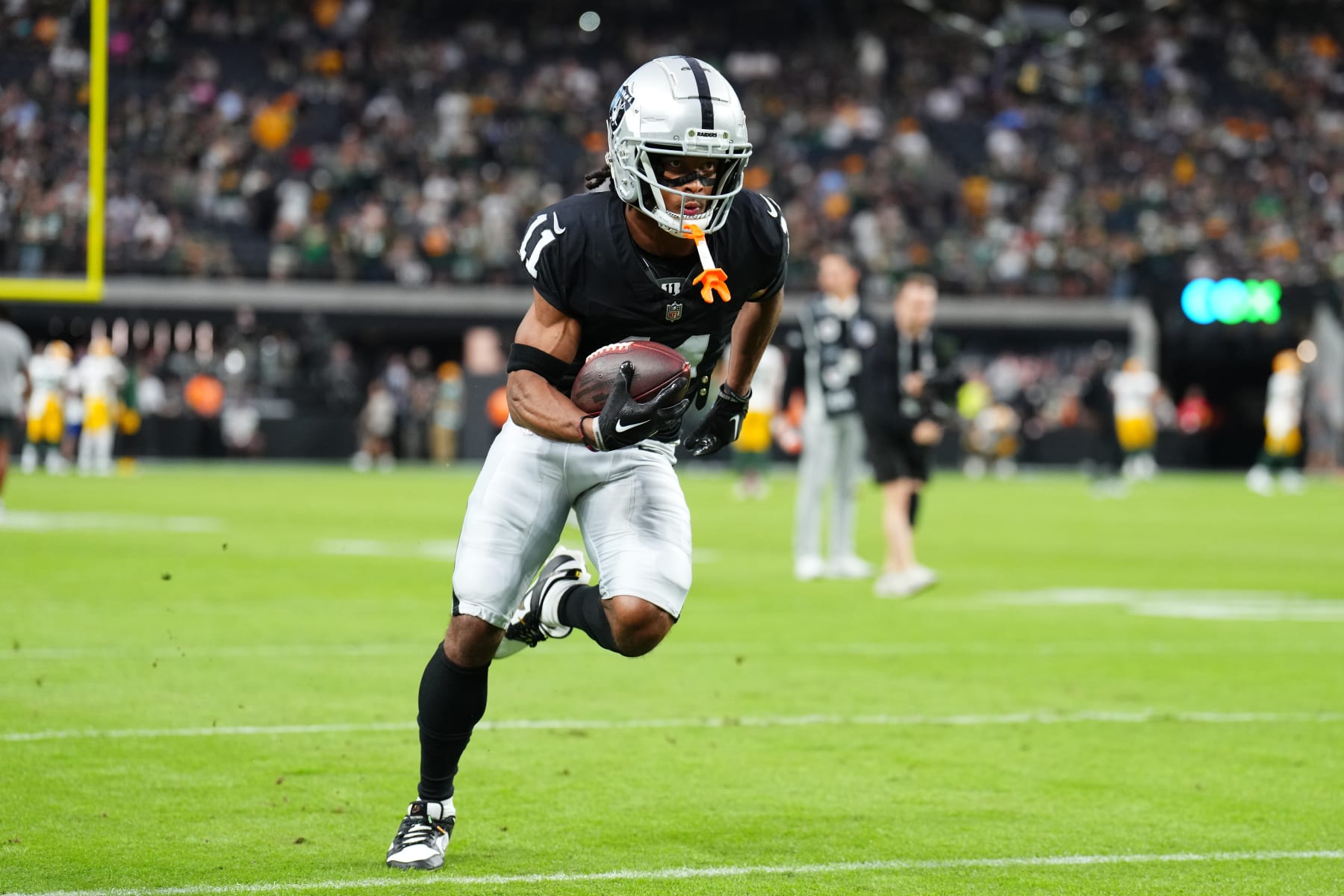 LAS VEGAS, NEVADA - OCTOBER 09: Wide receiver Tre Tucker #11 of the Las Vegas Raiders warms up before a game against the Green Bay Packers at Allegiant Stadium on October 09, 2023 in Las Vegas, Nevada. (Photo by Chris Unger/Getty Images)